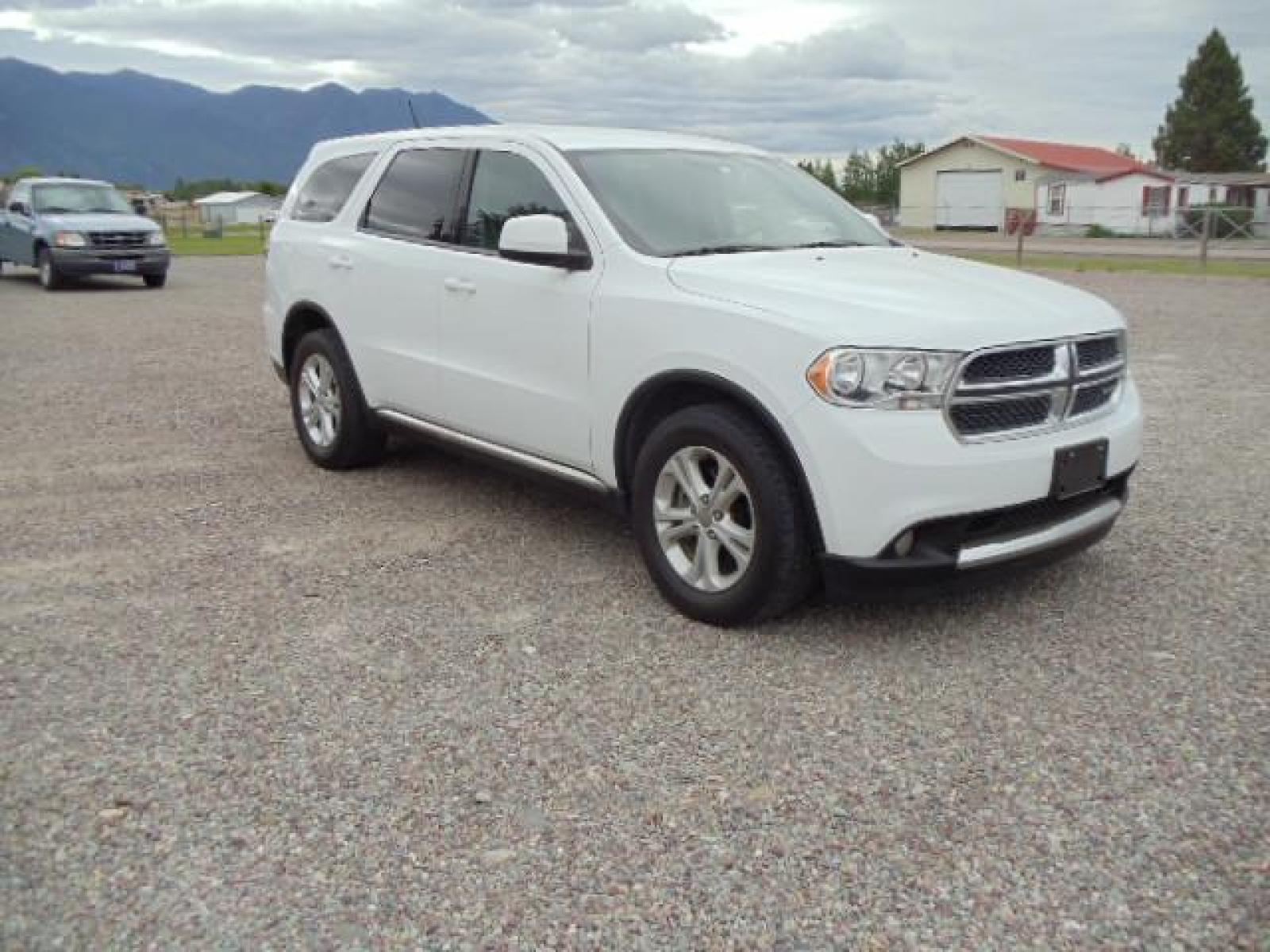 2013 White /Tan Dodge Durango SXT AWD (1C4RDJAG8DC) with an 3.6L V6 DOHC 24V engine, 5-Speed Automatic transmission, located at 5465 Highway 2 W., Columbia Falls, MT, 59912, (406) 892-4407, 48.352188, -114.240929 - Keyless entry Cruise control AC MP3 Tilt wheel Power windows door locks and mirrors Near new tires Front and rear heat and AC - Photo #0