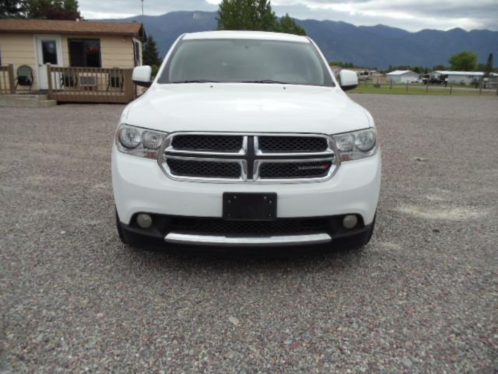 2013 White /Tan Dodge Durango SXT AWD (1C4RDJAG8DC) with an 3.6L V6 DOHC 24V engine, 5-Speed Automatic transmission, located at 5465 Highway 2 W., Columbia Falls, MT, 59912, (406) 892-4407, 48.352188, -114.240929 - Keyless entry Cruise control AC MP3 Tilt wheel Power windows door locks and mirrors Near new tires Front and rear heat and AC - Photo #1