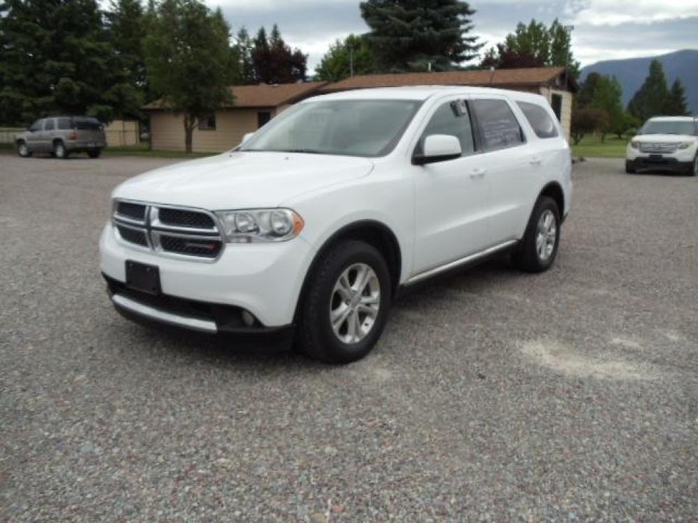 2013 White /Tan Dodge Durango SXT AWD (1C4RDJAG8DC) with an 3.6L V6 DOHC 24V engine, 5-Speed Automatic transmission, located at 5465 Highway 2 W., Columbia Falls, MT, 59912, (406) 892-4407, 48.352188, -114.240929 - Photo #2