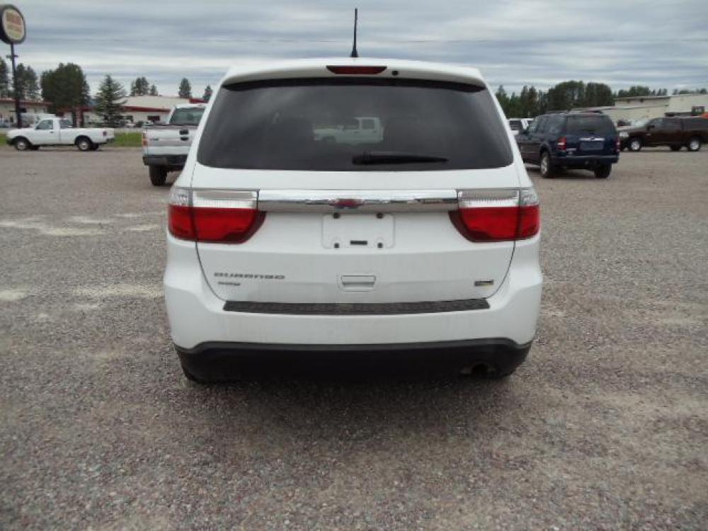 2013 White /Tan Dodge Durango SXT AWD (1C4RDJAG8DC) with an 3.6L V6 DOHC 24V engine, 5-Speed Automatic transmission, located at 5465 Highway 2 W., Columbia Falls, MT, 59912, (406) 892-4407, 48.352188, -114.240929 - Keyless entry Cruise control AC MP3 Tilt wheel Power windows door locks and mirrors Near new tires Front and rear heat and AC - Photo #5