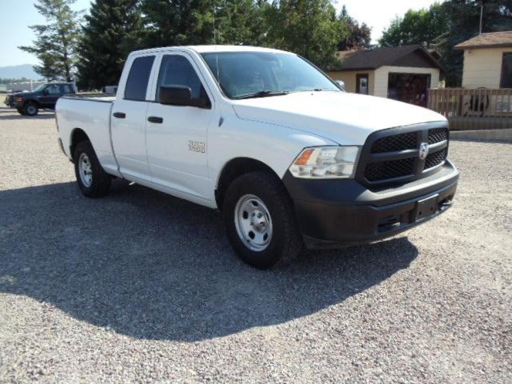 2013 White /Gray Ram 1500 Tradesman Quad Cab 4WD (1C6RR7FG9DS) with an 3.6L V6 engine, 6-Speed Automatic transmission, located at 5465 Highway 2 W., Columbia Falls, MT, 59912, (406) 892-4407, 48.352188, -114.240929 - Cruise control AC Tilt wheel Towing Power windows door locks and mirrors Near new tires Mechanically inspected - Photo #0