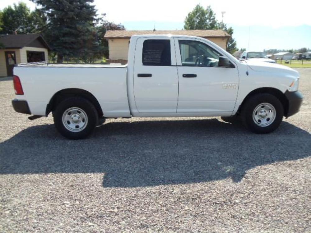 2013 White /Gray Ram 1500 Tradesman Quad Cab 4WD (1C6RR7FG9DS) with an 3.6L V6 engine, 6-Speed Automatic transmission, located at 5465 Highway 2 W., Columbia Falls, MT, 59912, (406) 892-4407, 48.352188, -114.240929 - Cruise control AC Tilt wheel Towing Power windows door locks and mirrors Near new tires Mechanically inspected - Photo #9