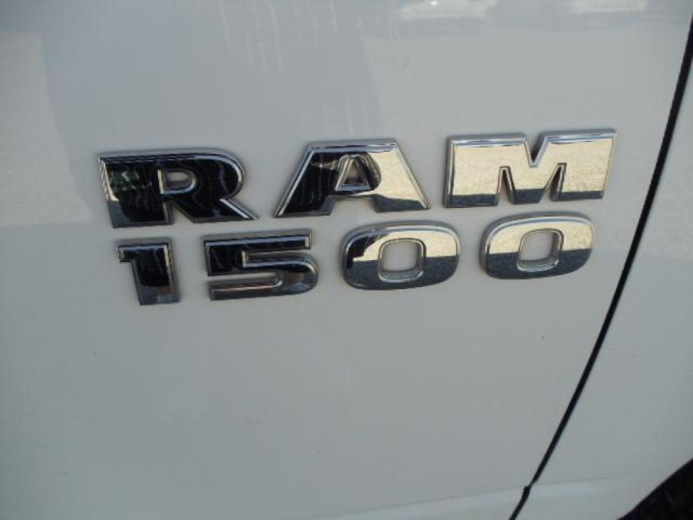2013 White /Gray Ram 1500 Tradesman Quad Cab 4WD (1C6RR7FG9DS) with an 3.6L V6 engine, 6-Speed Automatic transmission, located at 5465 Highway 2 W., Columbia Falls, MT, 59912, (406) 892-4407, 48.352188, -114.240929 - Photo #10