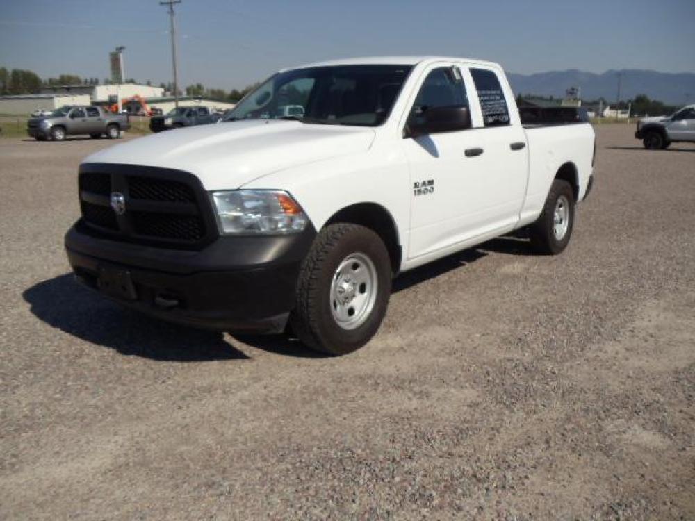 2013 White /Gray Ram 1500 Tradesman Quad Cab 4WD (1C6RR7FG9DS) with an 3.6L V6 engine, 6-Speed Automatic transmission, located at 5465 Highway 2 W., Columbia Falls, MT, 59912, (406) 892-4407, 48.352188, -114.240929 - Cruise control AC Tilt wheel Towing Power windows door locks and mirrors Near new tires Mechanically inspected - Photo #2
