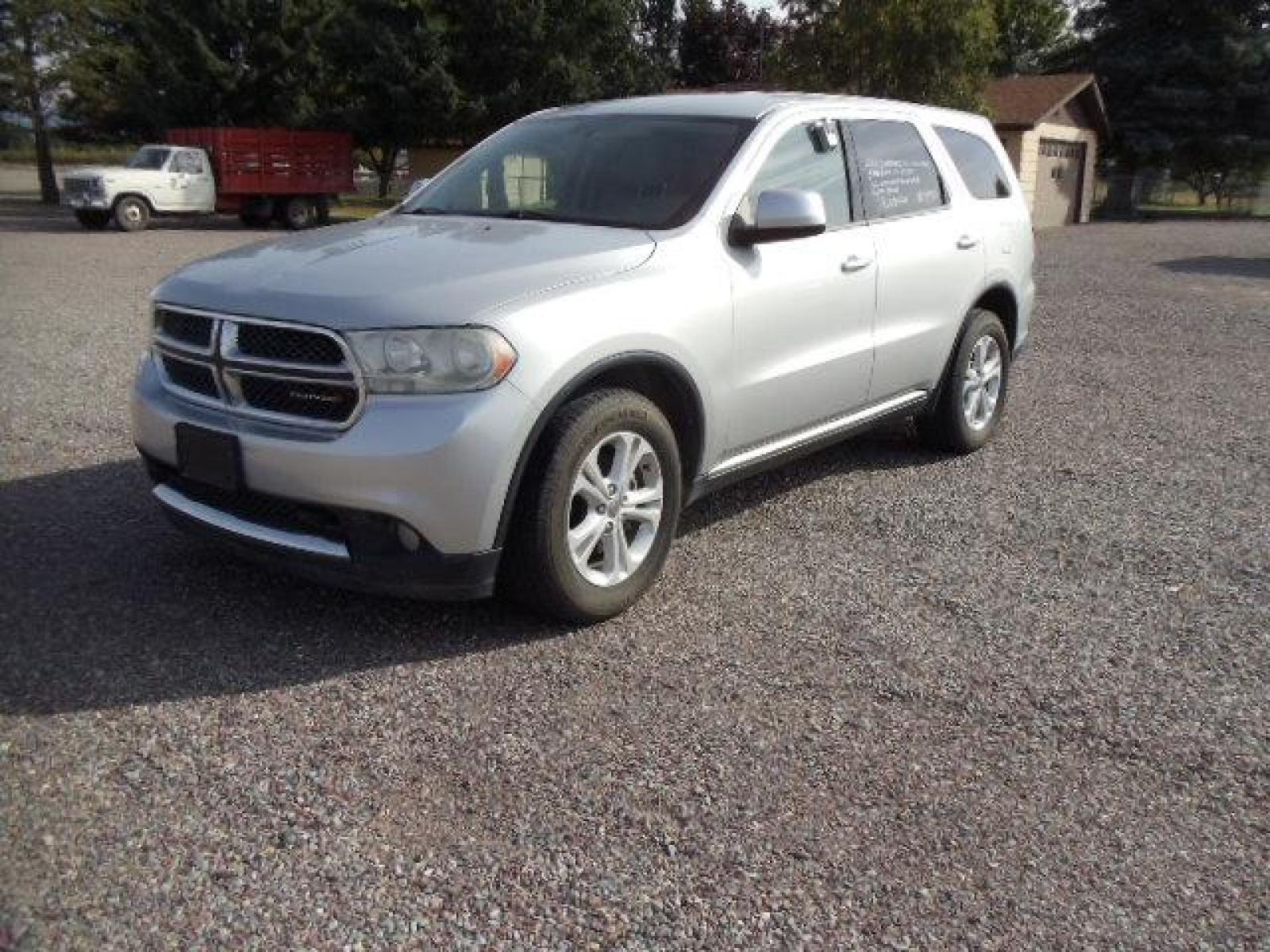 2012 Silver /Silver Dodge Durango SXT AWD (1C4RDJAG3CC) with an 3.6L V6 DOHC 24V engine, 5-Speed Automatic transmission, located at 5465 Highway 2 W., Columbia Falls, MT, 59912, (406) 892-4407, 48.352188, -114.240929 - Keyless entry Cruise control Front and rear heat and AC Power windows door locks and mirrors Tilt wheel - Photo #2