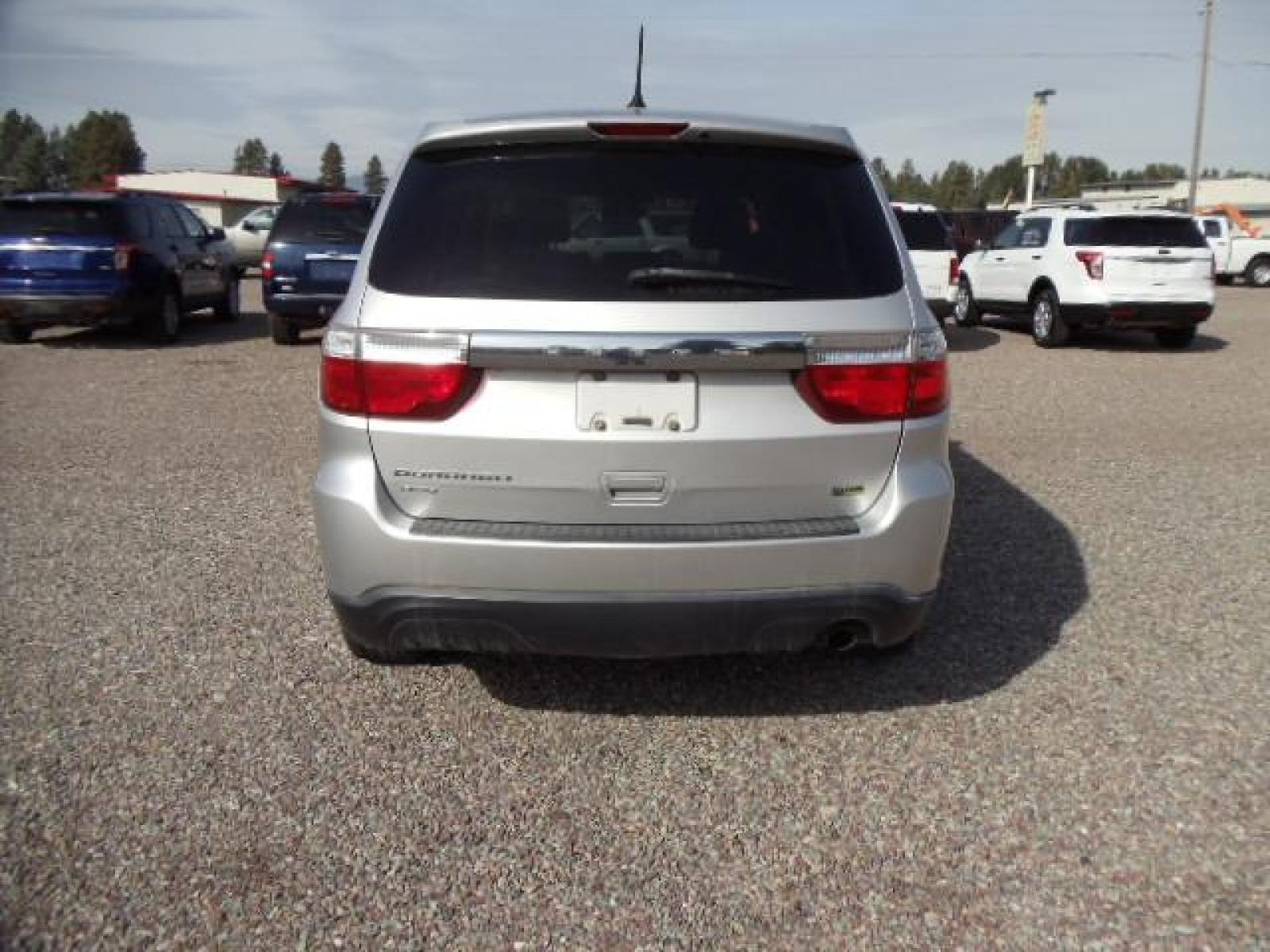 2012 Silver /Silver Dodge Durango SXT AWD (1C4RDJAG3CC) with an 3.6L V6 DOHC 24V engine, 5-Speed Automatic transmission, located at 5465 Highway 2 W., Columbia Falls, MT, 59912, (406) 892-4407, 48.352188, -114.240929 - Keyless entry Cruise control Front and rear heat and AC Power windows door locks and mirrors Tilt wheel - Photo #5