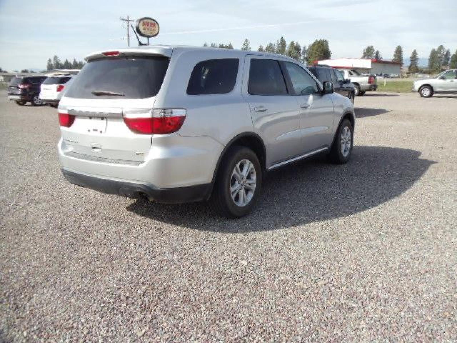 2012 Silver /Silver Dodge Durango SXT AWD (1C4RDJAG3CC) with an 3.6L V6 DOHC 24V engine, 5-Speed Automatic transmission, located at 5465 Highway 2 W., Columbia Falls, MT, 59912, (406) 892-4407, 48.352188, -114.240929 - Keyless entry Cruise control Front and rear heat and AC Power windows door locks and mirrors Tilt wheel - Photo #7