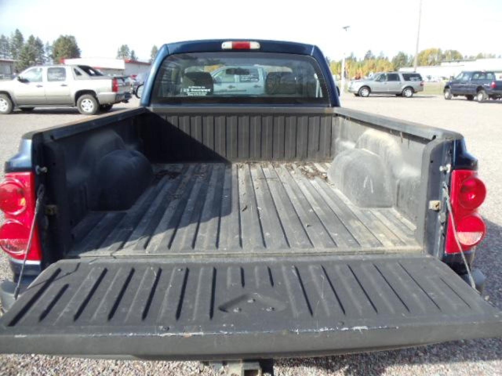 2007 Blue /Gray Dodge Dakota ST Club Cab 4WD (1D7HW22P27S) with an 4.7L V8 FFV engine, Automatic transmission, located at 5465 Highway 2 W., Columbia Falls, MT, 59912, (406) 892-4407, 48.352188, -114.240929 - Keyless entry Cruise control AC CD Tilt Wheel Power seat drivers only Power windows door locks and mirrors Near new tires - Photo #9