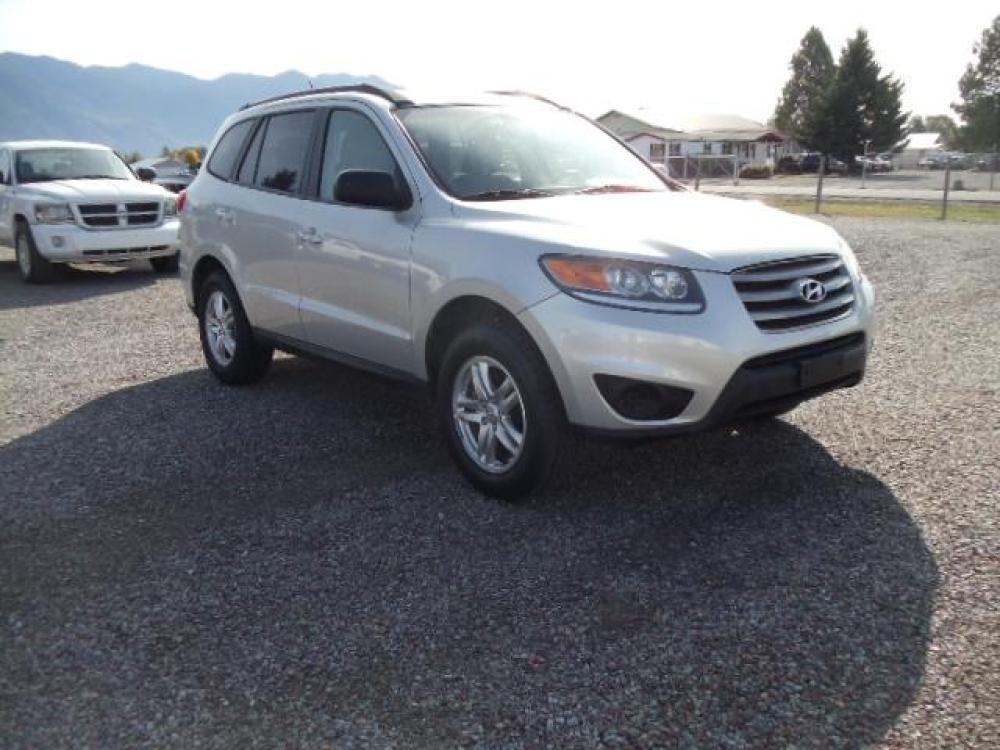 2012 Silver /Gray Hyundai Santa Fe GLS 2.4 4WD (5XYZGDAB4CG) with an 2.4L L4 DOHC 16V engine, 6-Speed Automatic transmission, located at 5465 Highway 2 W., Columbia Falls, MT, 59912, (406) 892-4407, 48.352188, -114.240929 - Photo #0