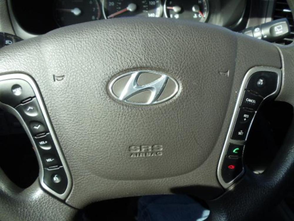 2012 Silver /Gray Hyundai Santa Fe GLS 2.4 4WD (5XYZGDAB4CG) with an 2.4L L4 DOHC 16V engine, 6-Speed Automatic transmission, located at 5465 Highway 2 W., Columbia Falls, MT, 59912, (406) 892-4407, 48.352188, -114.240929 - Keyless entry Cruise control AC Tilt wheel Power windows door locks and mirrors Brand new tires - Photo #18