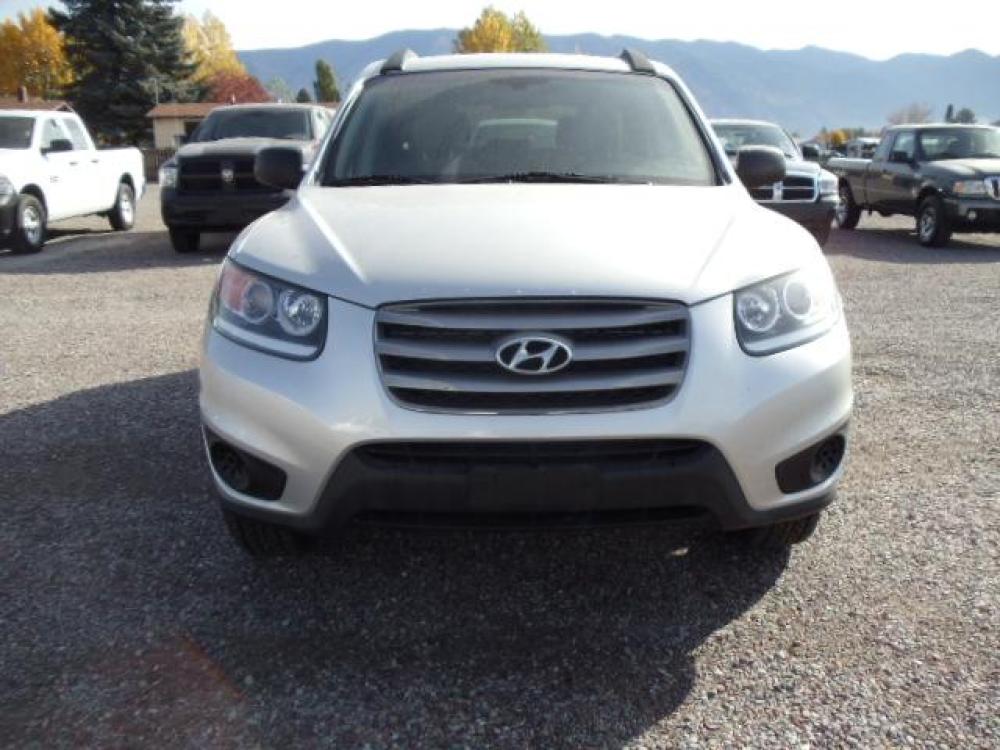 2012 Silver /Gray Hyundai Santa Fe GLS 2.4 4WD (5XYZGDAB4CG) with an 2.4L L4 DOHC 16V engine, 6-Speed Automatic transmission, located at 5465 Highway 2 W., Columbia Falls, MT, 59912, (406) 892-4407, 48.352188, -114.240929 - Keyless entry Cruise control AC Tilt wheel Power windows door locks and mirrors Brand new tires - Photo #1