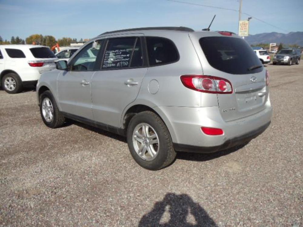 2012 Silver /Gray Hyundai Santa Fe GLS 2.4 4WD (5XYZGDAB4CG) with an 2.4L L4 DOHC 16V engine, 6-Speed Automatic transmission, located at 5465 Highway 2 W., Columbia Falls, MT, 59912, (406) 892-4407, 48.352188, -114.240929 - Keyless entry Cruise control AC Tilt wheel Power windows door locks and mirrors Brand new tires - Photo #4