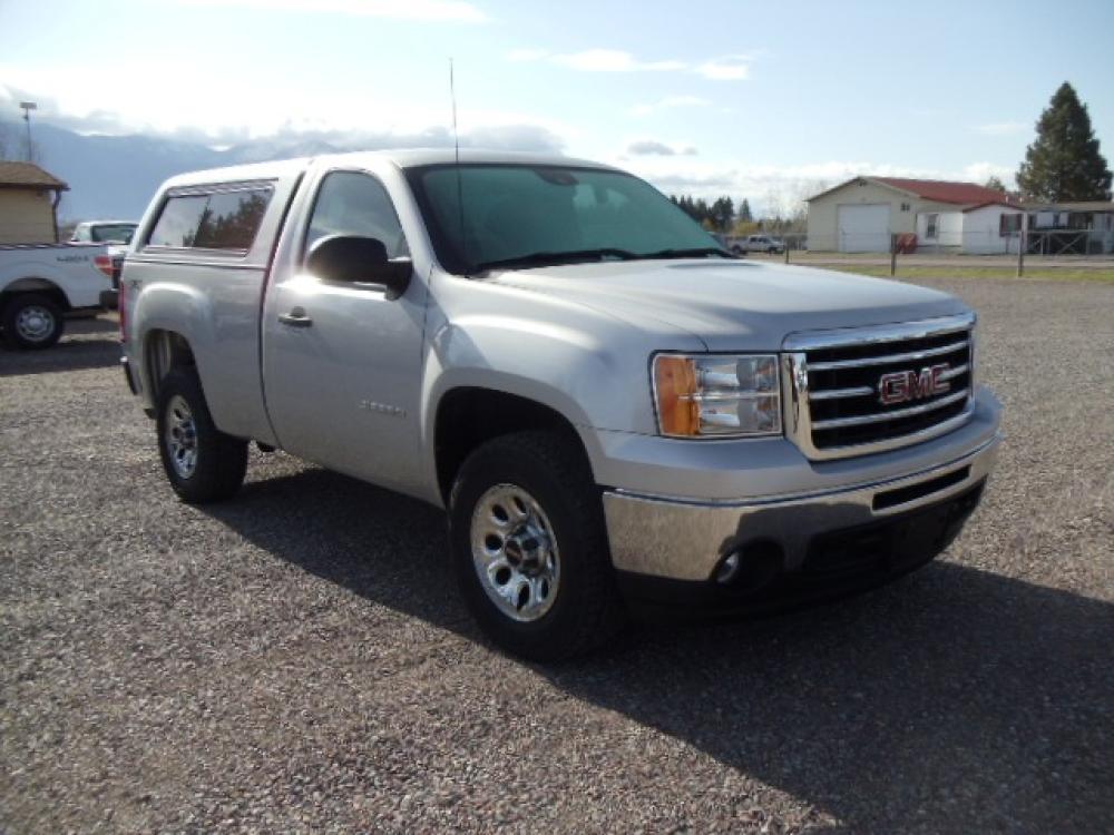2013 Silver /Grey GMC Sierra 1500 Work Truck 4WD (1GTN2TEXXDZ) with an 4.3L V6 OHV 12V engine, 6-Speed Automatic transmission, located at 5465 Highway 2 W., Columbia Falls, MT, 59912, (406) 892-4407, 48.352188, -114.240929 - This truck is a local trade in. The truck is clean inside and out with near new tires and low actual miles. - Photo #0