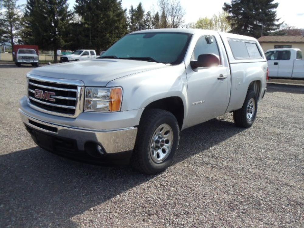 2013 Silver /Grey GMC Sierra 1500 Work Truck 4WD (1GTN2TEXXDZ) with an 4.3L V6 OHV 12V engine, 6-Speed Automatic transmission, located at 5465 Highway 2 W., Columbia Falls, MT, 59912, (406) 892-4407, 48.352188, -114.240929 - This truck is a local trade in. The truck is clean inside and out with near new tires and low actual miles. - Photo #2