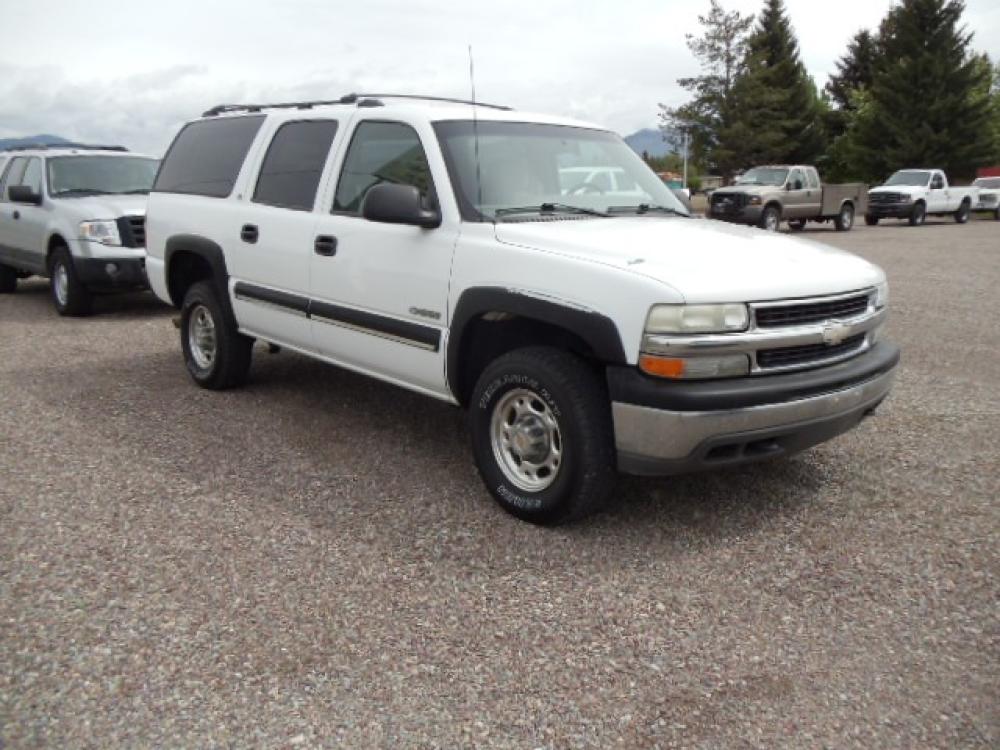 2000 White /Silver Chevrolet Suburban K2500 4WD (3GNGK26U6YG) with an 6.0L V8 OHV 16V engine, 4-Speed Automatic Overdrive transmission, located at 5465 Highway 2 W., Columbia Falls, MT, 59912, (406) 892-4407, 48.352188, -114.240929 - Photo #0