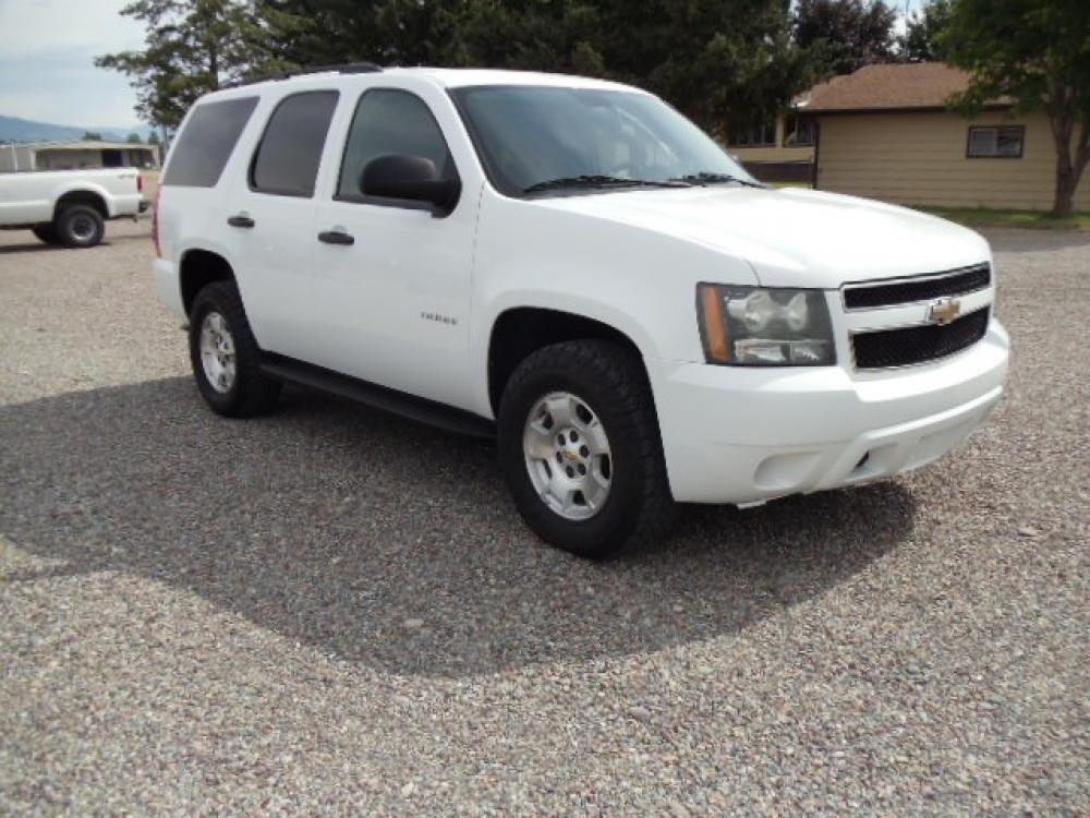 2010 White /Gray Chevrolet Tahoe LS 4WD (1GNUKAE05AR) with an 5.3L V8 OHV 16V FFV engine, 6-Speed Automatic transmission, located at 5465 Highway 2 W., Columbia Falls, MT, 59912, (406) 892-4407, 48.352188, -114.240929 - Photo #0