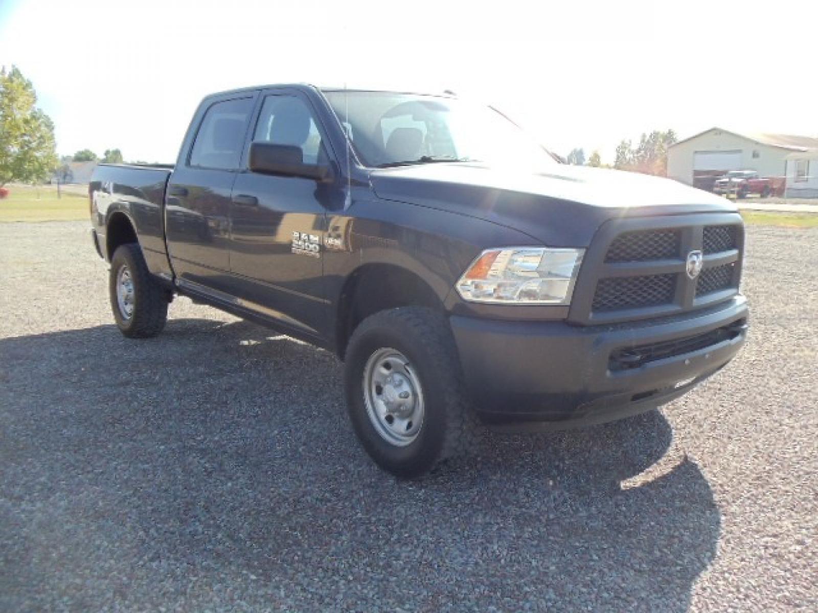 2014 Blue /Grey RAM 2500 Tradesman (3C6TR5CT3EG) with an 5.7L V8 OHV 16V engine, 6-Speed Automatic transmission, located at 5465 Highway 2 W., Columbia Falls, MT, 59912, (406) 892-4407, 48.352188, -114.240929 - Photo #0