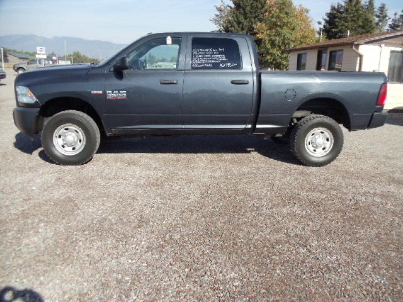 2014 Blue /Grey RAM 2500 Tradesman (3C6TR5CT3EG) with an 5.7L V8 OHV 16V engine, 6-Speed Automatic transmission, located at 5465 Highway 2 W., Columbia Falls, MT, 59912, (406) 892-4407, 48.352188, -114.240929 - Photo #3