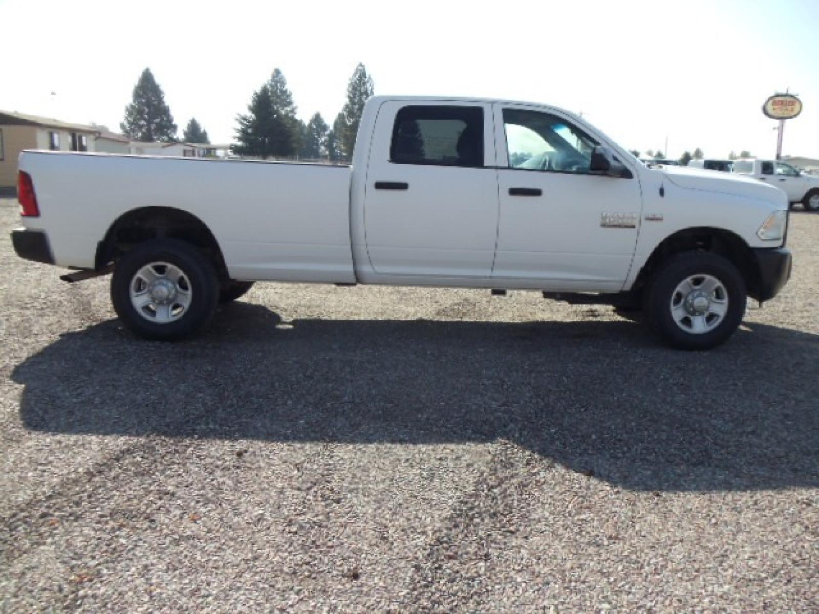 2014 White /Grey RAM 3500 Tradesman (3C63R3GT8EG) with an 5.7L V8 OHV 16V engine, 6-Speed Automatic transmission, located at 5465 Highway 2 W., Columbia Falls, MT, 59912, (406) 892-4407, 48.352188, -114.240929 - Photo #9