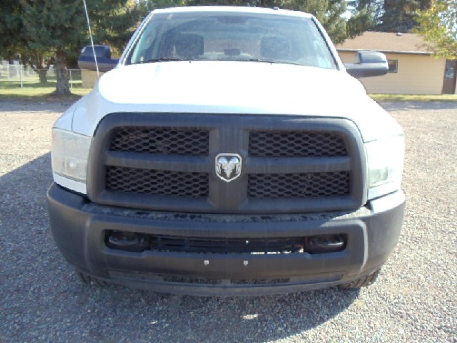 2014 White /Grey RAM 3500 Tradesman (3C63R3GT8EG) with an 5.7L V8 OHV 16V engine, 6-Speed Automatic transmission, located at 5465 Highway 2 W., Columbia Falls, MT, 59912, (406) 892-4407, 48.352188, -114.240929 - Photo #1