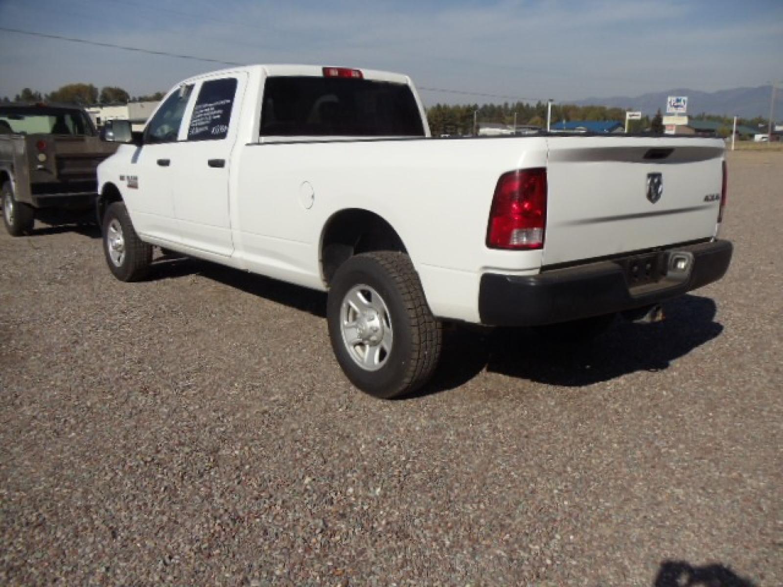 2014 White /Grey RAM 3500 Tradesman (3C63R3GT8EG) with an 5.7L V8 OHV 16V engine, 6-Speed Automatic transmission, located at 5465 Highway 2 W., Columbia Falls, MT, 59912, (406) 892-4407, 48.352188, -114.240929 - Photo #4