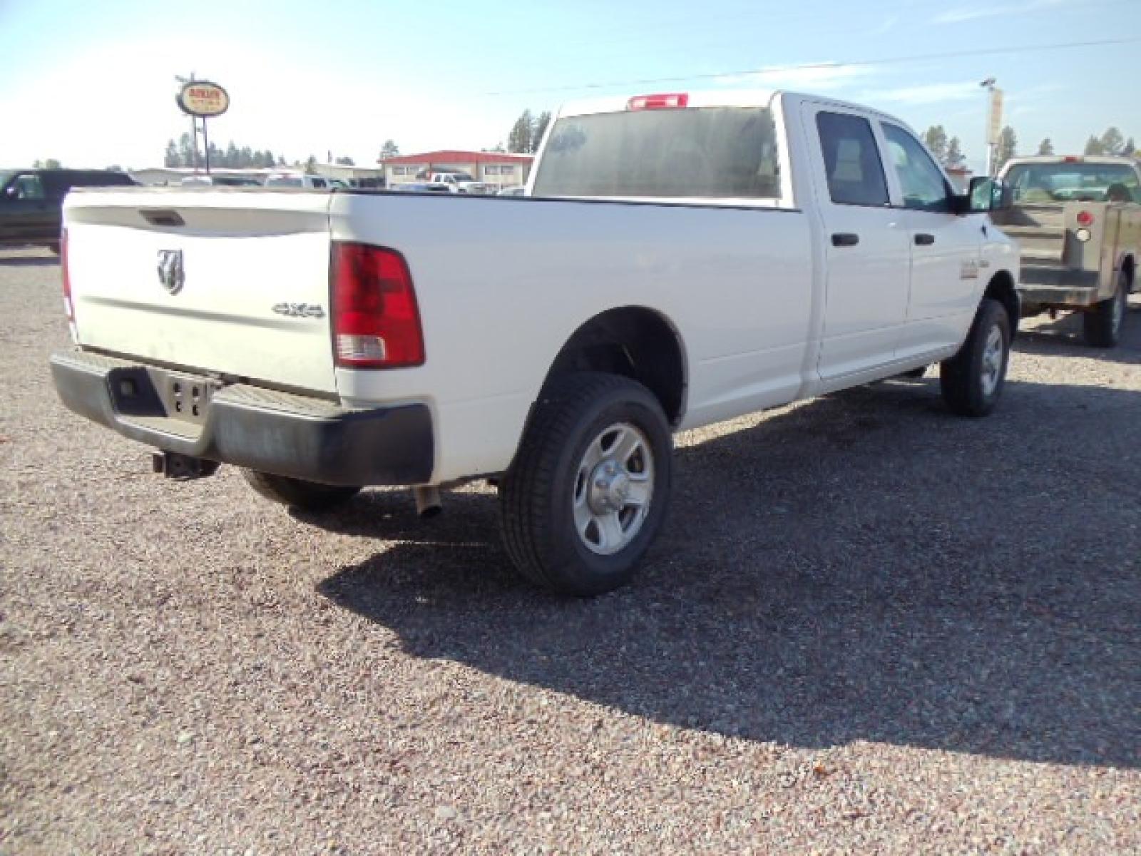 2014 White /Grey RAM 3500 Tradesman (3C63R3GT8EG) with an 5.7L V8 OHV 16V engine, 6-Speed Automatic transmission, located at 5465 Highway 2 W., Columbia Falls, MT, 59912, (406) 892-4407, 48.352188, -114.240929 - Photo #8