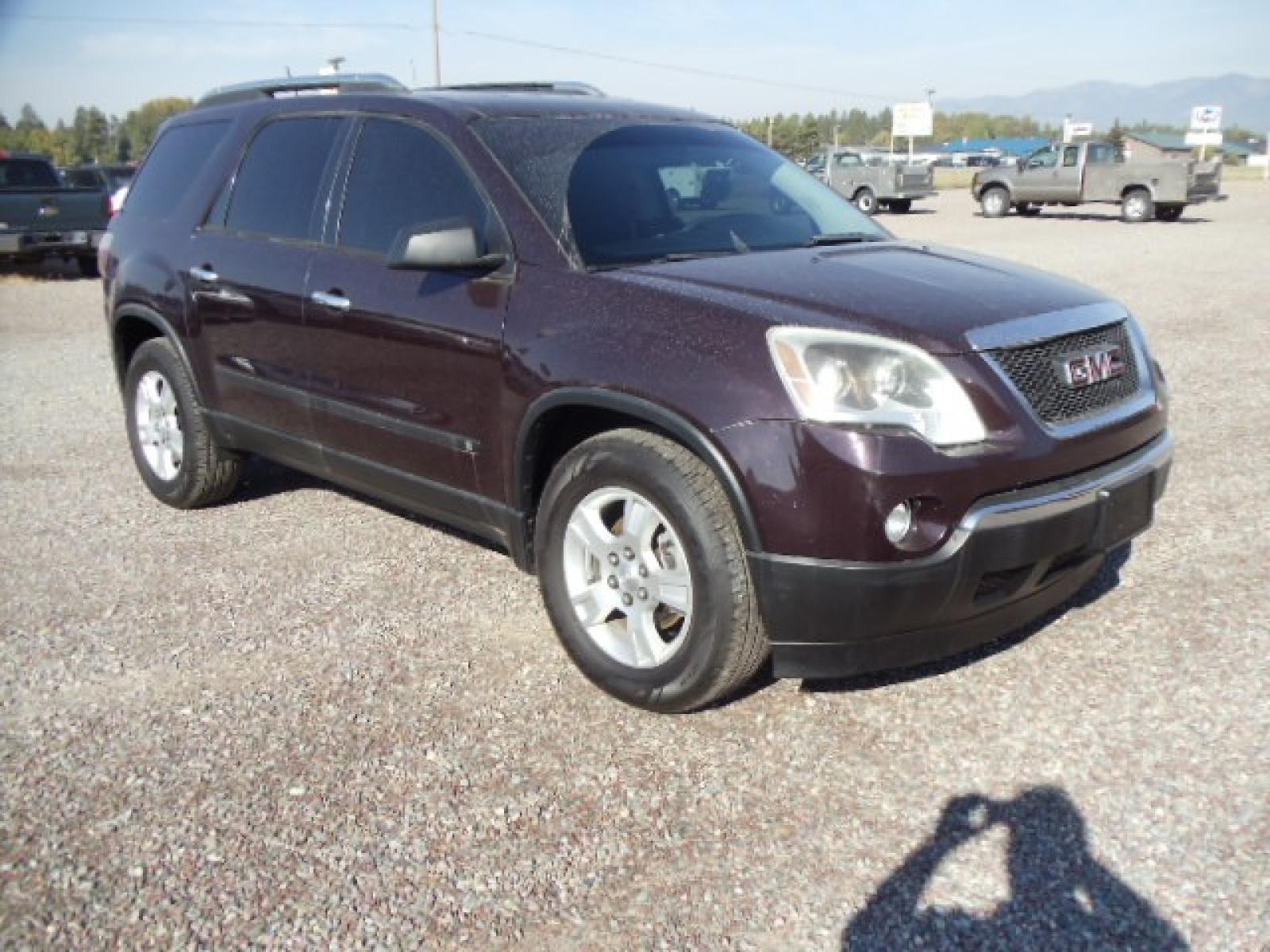 2009 Purple /Silver GMC Acadia SLE-1 AWD (1GKEV13D29J) with an 3.6L V6 DOHC 24V engine, 6-Speed Automatic transmission, located at 5465 Highway 2 W., Columbia Falls, MT, 59912, (406) 892-4407, 48.352188, -114.240929 - Photo #0