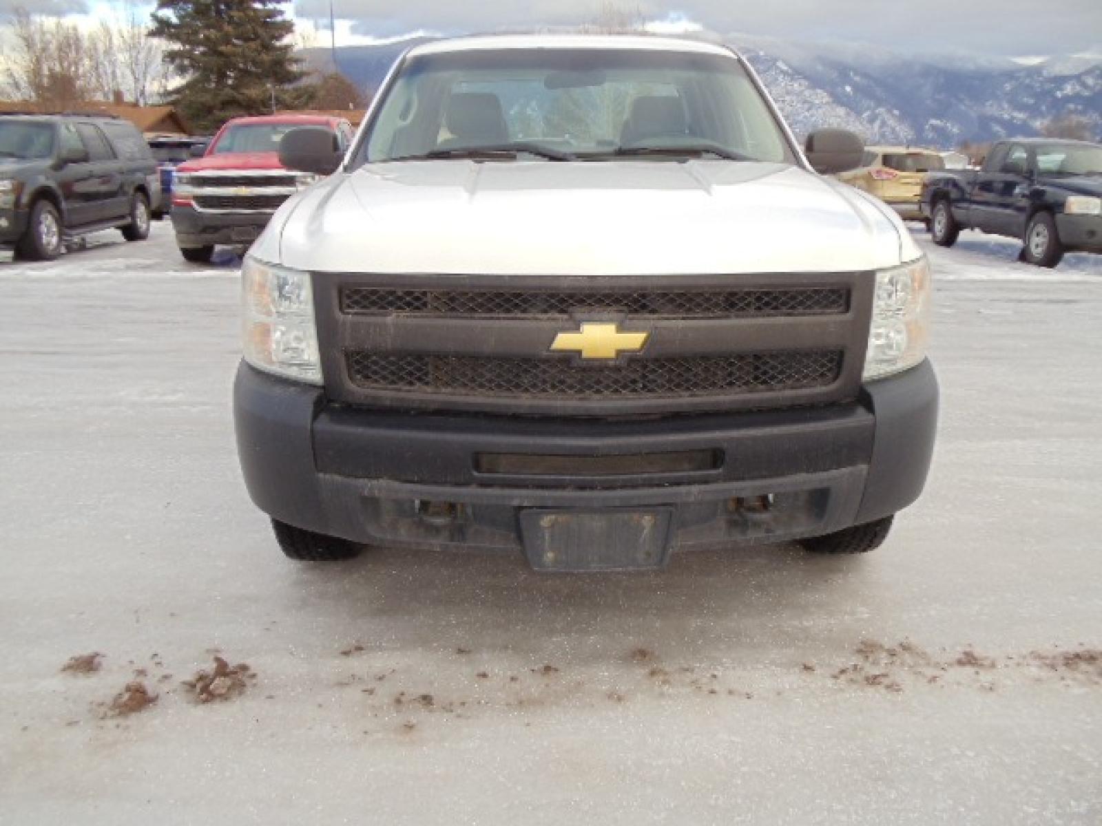 2012 White /Gray Chevrolet Silverado 1500 Work Truck Ext. Cab 4WD (1GCRKPE06CZ) with an 5.3L V8 OHV 16V FFV engine, 4-Speed Automatic transmission, located at 5465 Highway 2 W., Columbia Falls, MT, 59912, (406) 892-4407, 48.352188, -114.240929 - This truck was previously owned by the federal government so it has been well maintained and taken care of. The truck is clean inside and out with good tires and low actual miles. This is the Quad Door Long Box. - Photo #1
