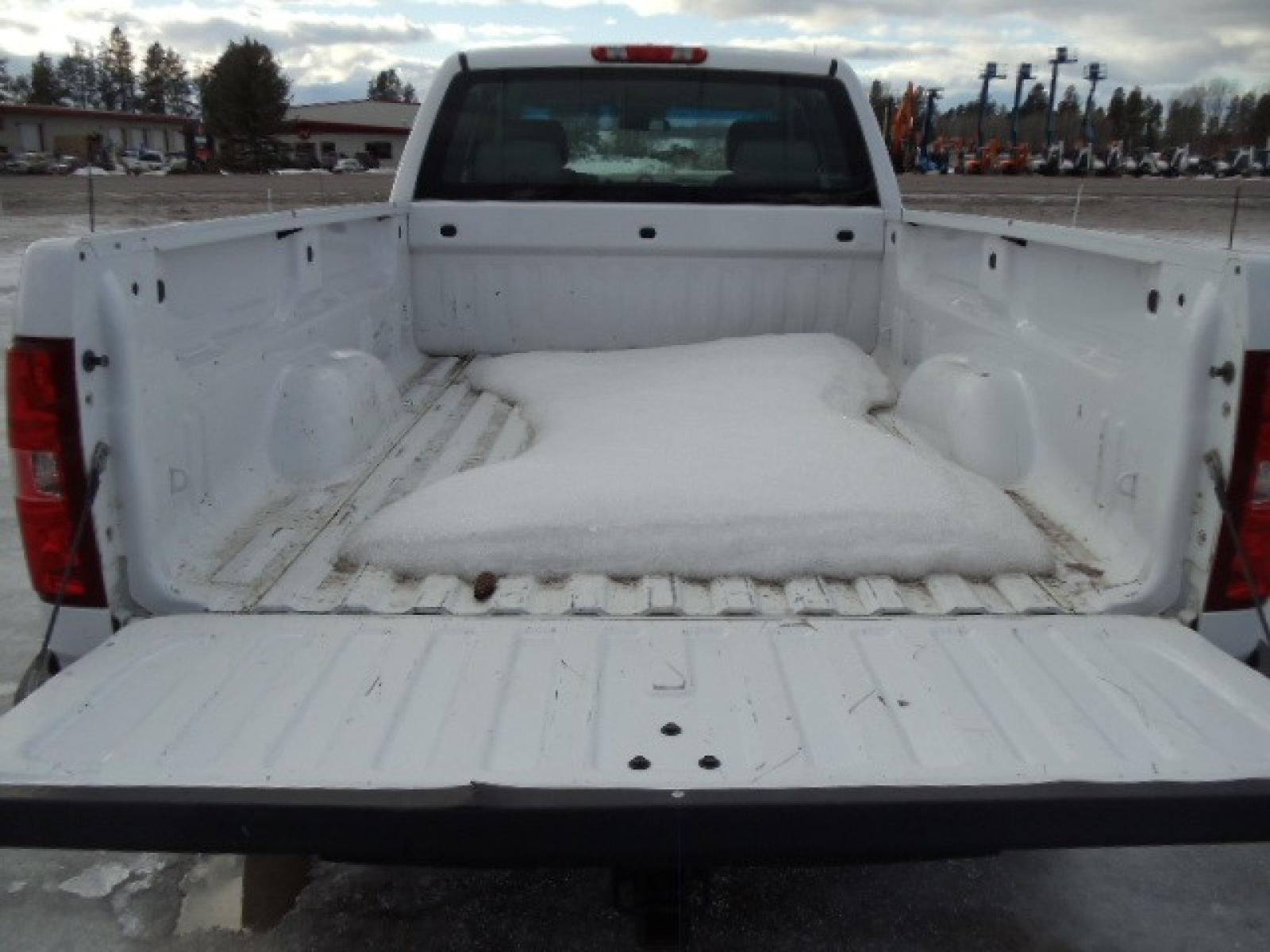 2012 White /Gray Chevrolet Silverado 1500 Work Truck Ext. Cab 4WD (1GCRKPE06CZ) with an 5.3L V8 OHV 16V FFV engine, 4-Speed Automatic transmission, located at 5465 Highway 2 W., Columbia Falls, MT, 59912, (406) 892-4407, 48.352188, -114.240929 - This truck was previously owned by the federal government so it has been well maintained and taken care of. The truck is clean inside and out with good tires and low actual miles. This is the Quad Door Long Box. - Photo #7