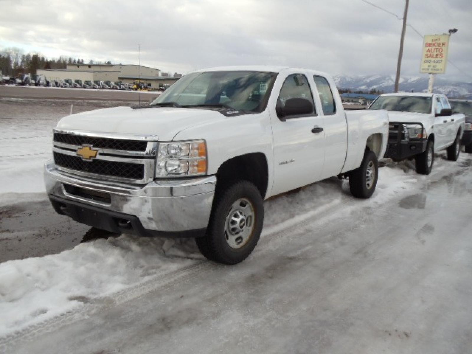 2012 White /Gray Chevrolet Silverado 2500HD Work Truck Ext. Cab 4WD (1GC2KVCG0CZ) with an 6.0L V8 OHV 16V FFV engine, 6-Speed Automatic transmission, located at 5465 Highway 2 W., Columbia Falls, MT, 59912, (406) 892-4407, 48.352188, -114.240929 - This truck was previously owned by the federal government so it has been well maintained and taken care of. This truck is very clean inside and out with good tires and low miles. This is the quad door short box with the 6.0L V8 gas motor. - Photo #2