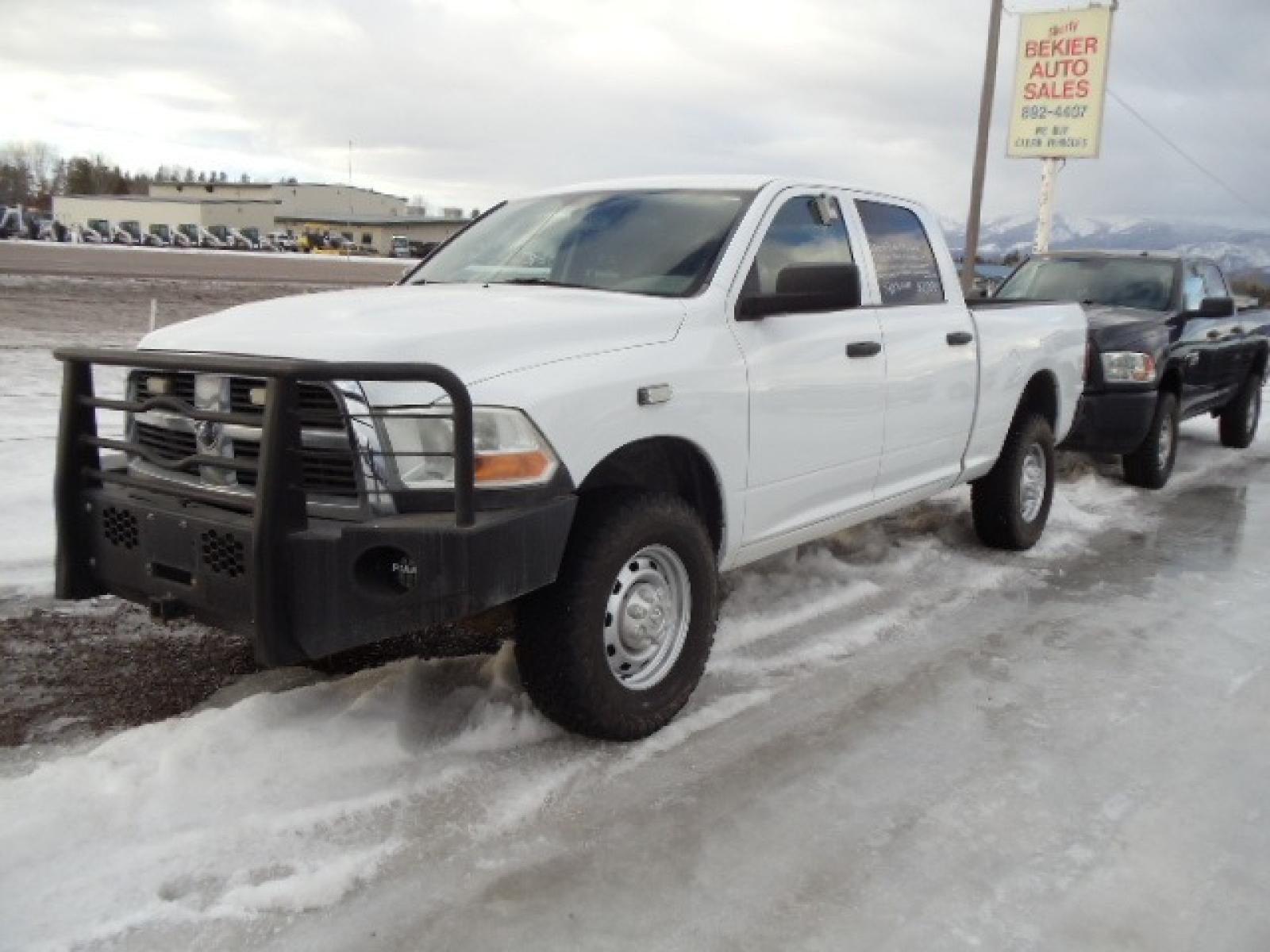 2010 White /Gray Dodge Ram 2500 ST (3D7TT2CT9AG) with an 5.7L V8 OHV 16V engine, Automatic transmission, located at 5465 Highway 2 W., Columbia Falls, MT, 59912, (406) 892-4407, 48.352188, -114.240929 - This truck was previously owned by the federal government so it has been well maintained and taken care of. The truck is very clean inside and out with great tires and low actual miles. This is the crew cab short box with the 5.7L HEMI gas motor. This vehicle has been mechanically inspected. The - Photo #2
