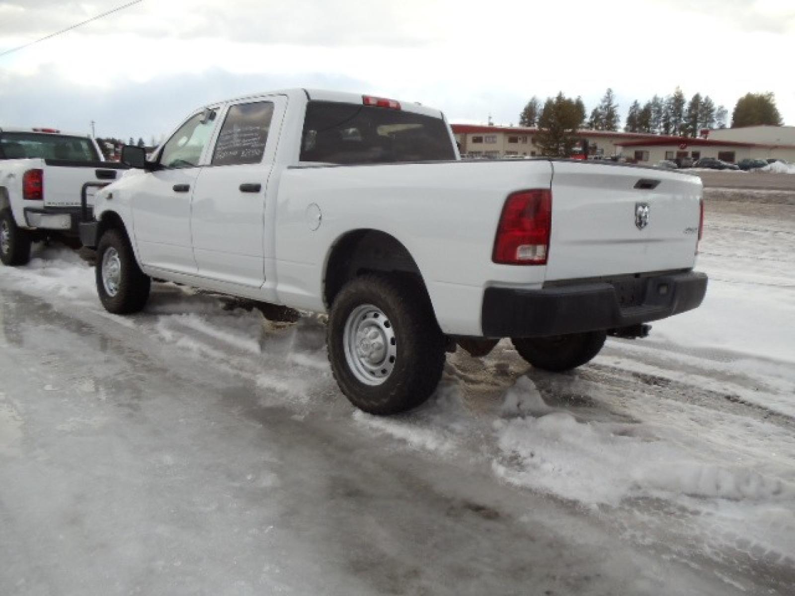 2010 White /Gray Dodge Ram 2500 ST (3D7TT2CT9AG) with an 5.7L V8 OHV 16V engine, Automatic transmission, located at 5465 Highway 2 W., Columbia Falls, MT, 59912, (406) 892-4407, 48.352188, -114.240929 - This truck was previously owned by the federal government so it has been well maintained and taken care of. The truck is very clean inside and out with great tires and low actual miles. This is the crew cab short box with the 5.7L HEMI gas motor. This vehicle has been mechanically inspected. The - Photo #4