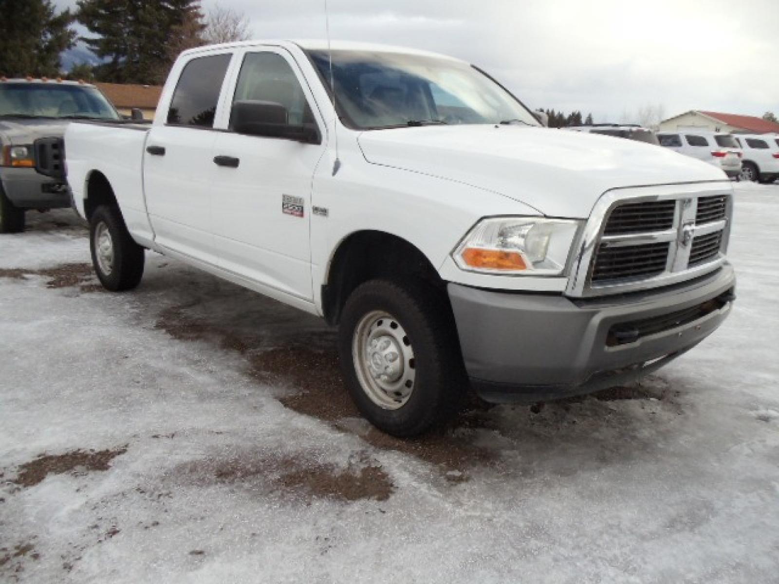 2011 Gray /Gray Dodge Ram 2500 ST Crew Cab 4WD (3D7TT2CT2BG) with an 5.7L V8 OHV 16V engine, Automatic transmission, located at 5465 Highway 2 W., Columbia Falls, MT, 59912, (406) 892-4407, 48.352188, -114.240929 - This truck was previously owned by the federal government so it has been well maintained and taken care of. This truck is very clean inside and out with good tires and low actual miles. This is the crew cab short box with the 5.7L HEMI V8 gas motor. - Photo #0