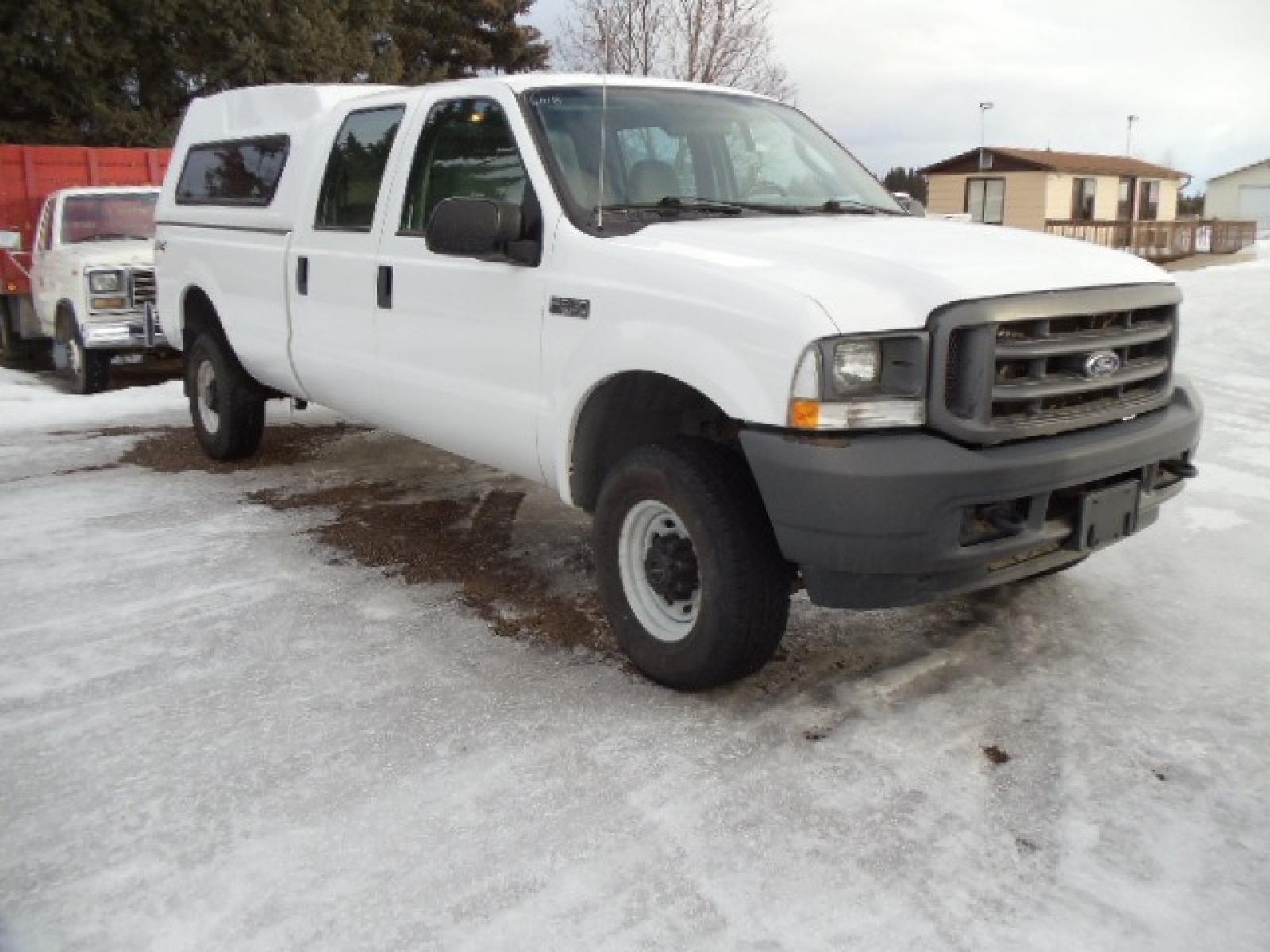 2004 Gray /Gray Ford F-350 SD XL Crew Cab 4WD (1FTSW31L04E) with an 5.4L V8 SOHC 16V engine, 6 Speed Manual transmission, located at 5465 Highway 2 W., Columbia Falls, MT, 59912, (406) 892-4407, 48.352188, -114.240929 - This truck was previously owned by the federal government so it has been well maintained and taken care of. The truck is clean inside and out with good tires and low actual miles. This is the crew cab long box with the 5.4L V8 gas motor. This vehicle is rare with the 6 speed manual transmission. - Photo #0