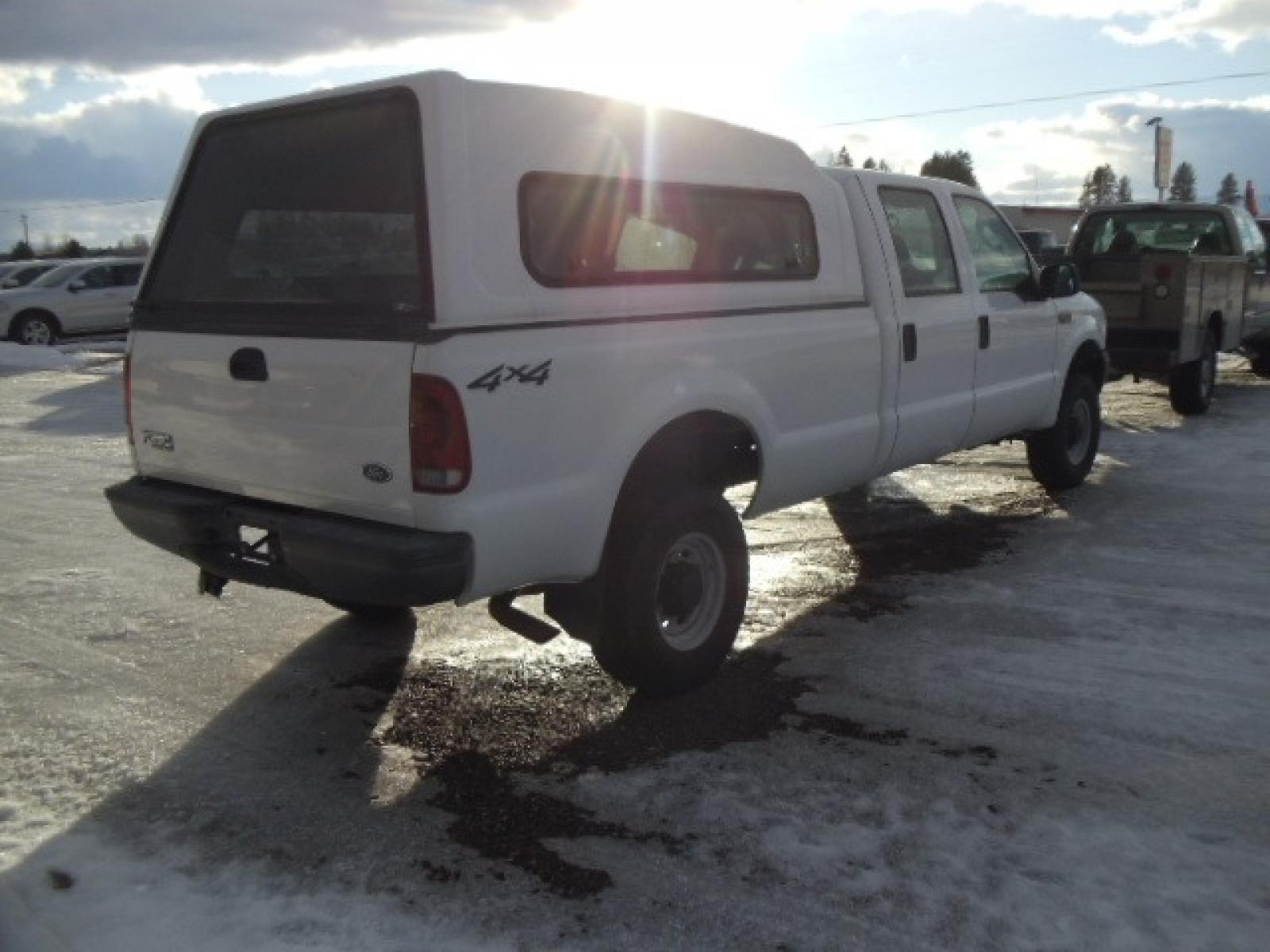 2004 Gray /Gray Ford F-350 SD XL Crew Cab 4WD (1FTSW31L04E) with an 5.4L V8 SOHC 16V engine, 6 Speed Manual transmission, located at 5465 Highway 2 W., Columbia Falls, MT, 59912, (406) 892-4407, 48.352188, -114.240929 - This truck was previously owned by the federal government so it has been well maintained and taken care of. The truck is clean inside and out with good tires and low actual miles. This is the crew cab long box with the 5.4L V8 gas motor. This vehicle is rare with the 6 speed manual transmission. - Photo #8