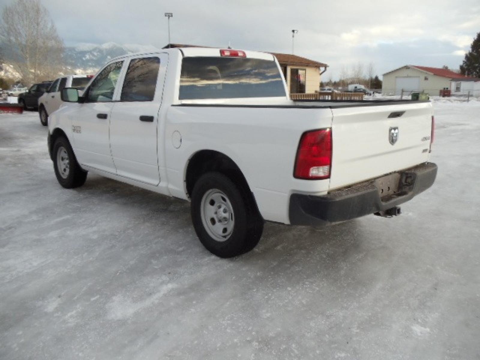 2014 Gray /Gray RAM 1500 Tradesman Crew Cab SWB 4WD (1C6RR7KG3ES) with an 3.6L V6 DOHC 24V FFV engine, 6-Speed Automatic transmission, located at 5465 Highway 2 W., Columbia Falls, MT, 59912, (406) 892-4407, 48.352188, -114.240929 - This truck was previously owned by the federal government so it has been well maintained and taken care of. The vehicle is very clean inside and out with great tires and low miles. This is the crew cab short box. - Photo #4