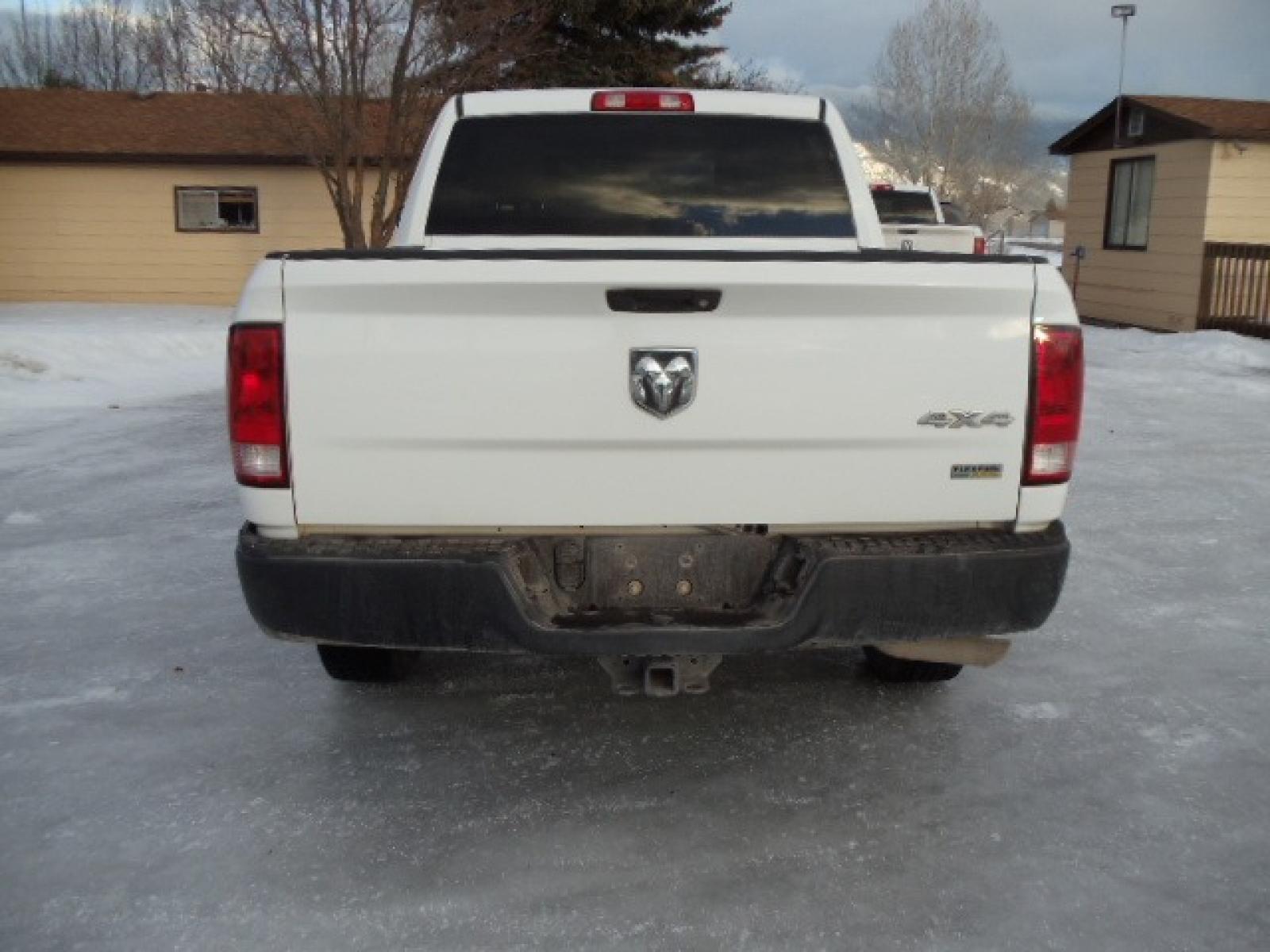 2014 Gray /Gray RAM 1500 Tradesman Crew Cab SWB 4WD (1C6RR7KG3ES) with an 3.6L V6 DOHC 24V FFV engine, 6-Speed Automatic transmission, located at 5465 Highway 2 W., Columbia Falls, MT, 59912, (406) 892-4407, 48.352188, -114.240929 - This truck was previously owned by the federal government so it has been well maintained and taken care of. The vehicle is very clean inside and out with great tires and low miles. This is the crew cab short box. - Photo #5