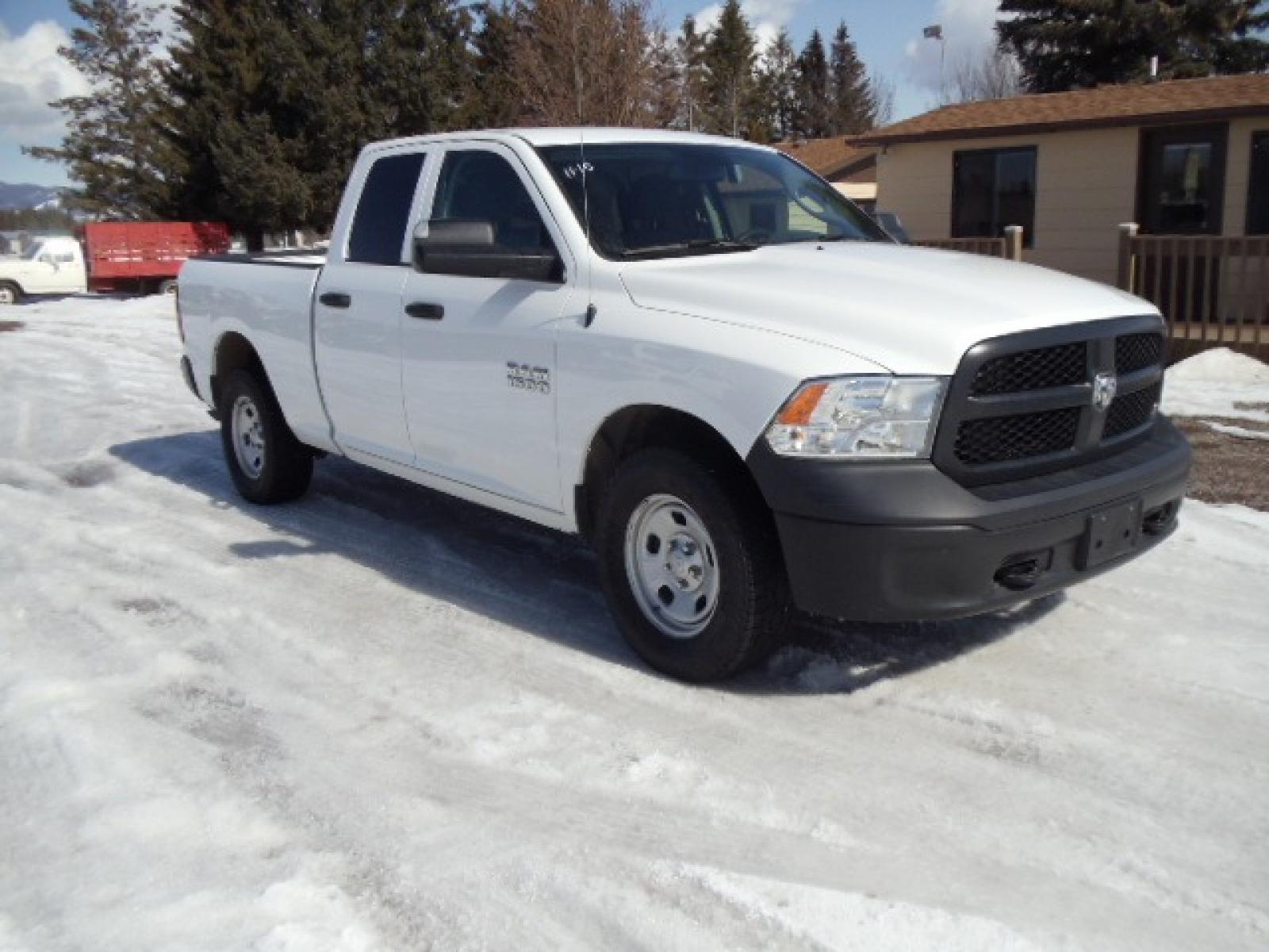 2016 White /Gray RAM 1500 Tradesman Quad Cab 4WD (1C6RR7FG7GS) with an 3.6L V6 DOHC 24V FFV engine, 6A transmission, located at 5465 Highway 2 W., Columbia Falls, MT, 59912, (406) 892-4407, 48.352188, -114.240929 - Photo #0