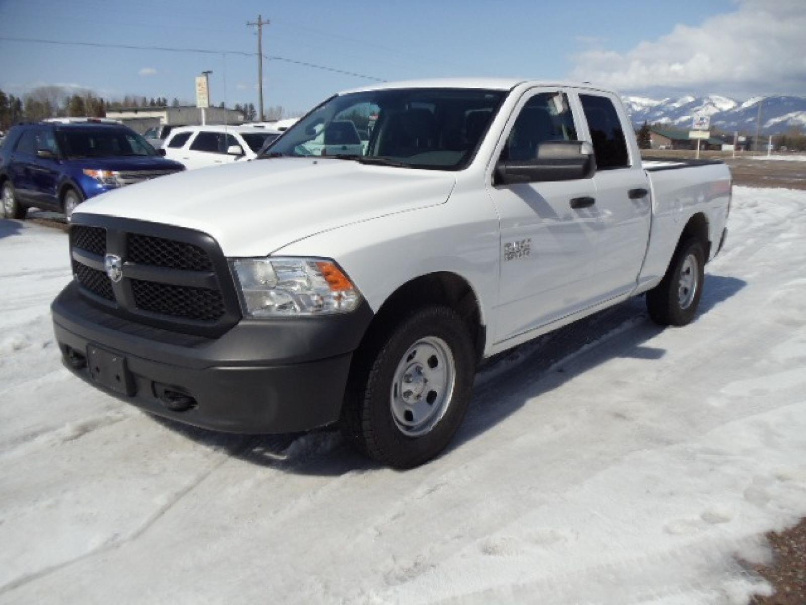 2016 White /Gray RAM 1500 Tradesman Quad Cab 4WD (1C6RR7FG7GS) with an 3.6L V6 DOHC 24V FFV engine, 6A transmission, located at 5465 Highway 2 W., Columbia Falls, MT, 59912, (406) 892-4407, 48.352188, -114.240929 - Photo #2