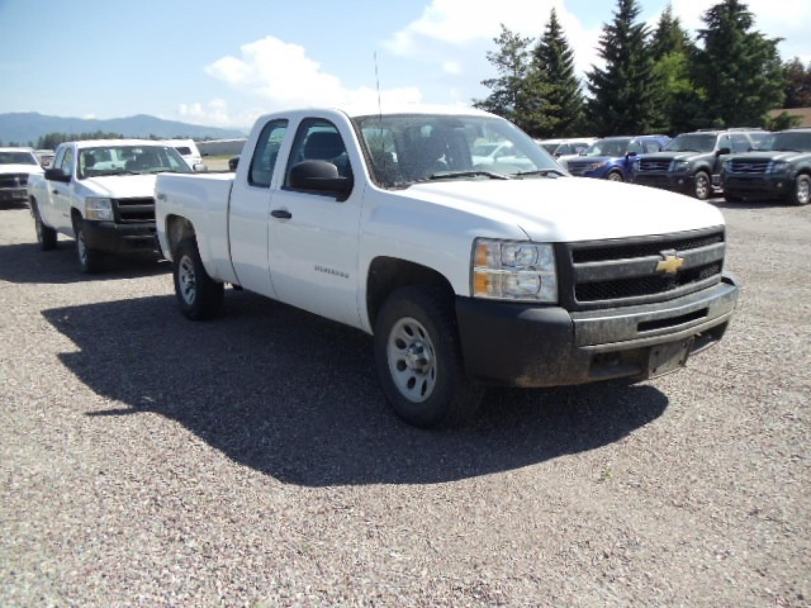 2012 White /Grey Chevrolet Silverado 1500 Work Truck Ext. Cab 4WD (1GCRKPE75CZ) with an 5.3L V8 OHV 16V FFV engine, 4-Speed Automatic transmission, located at 5465 Highway 2 W., Columbia Falls, MT, 59912, (406) 892-4407, 48.352188, -114.240929 - Photo #0
