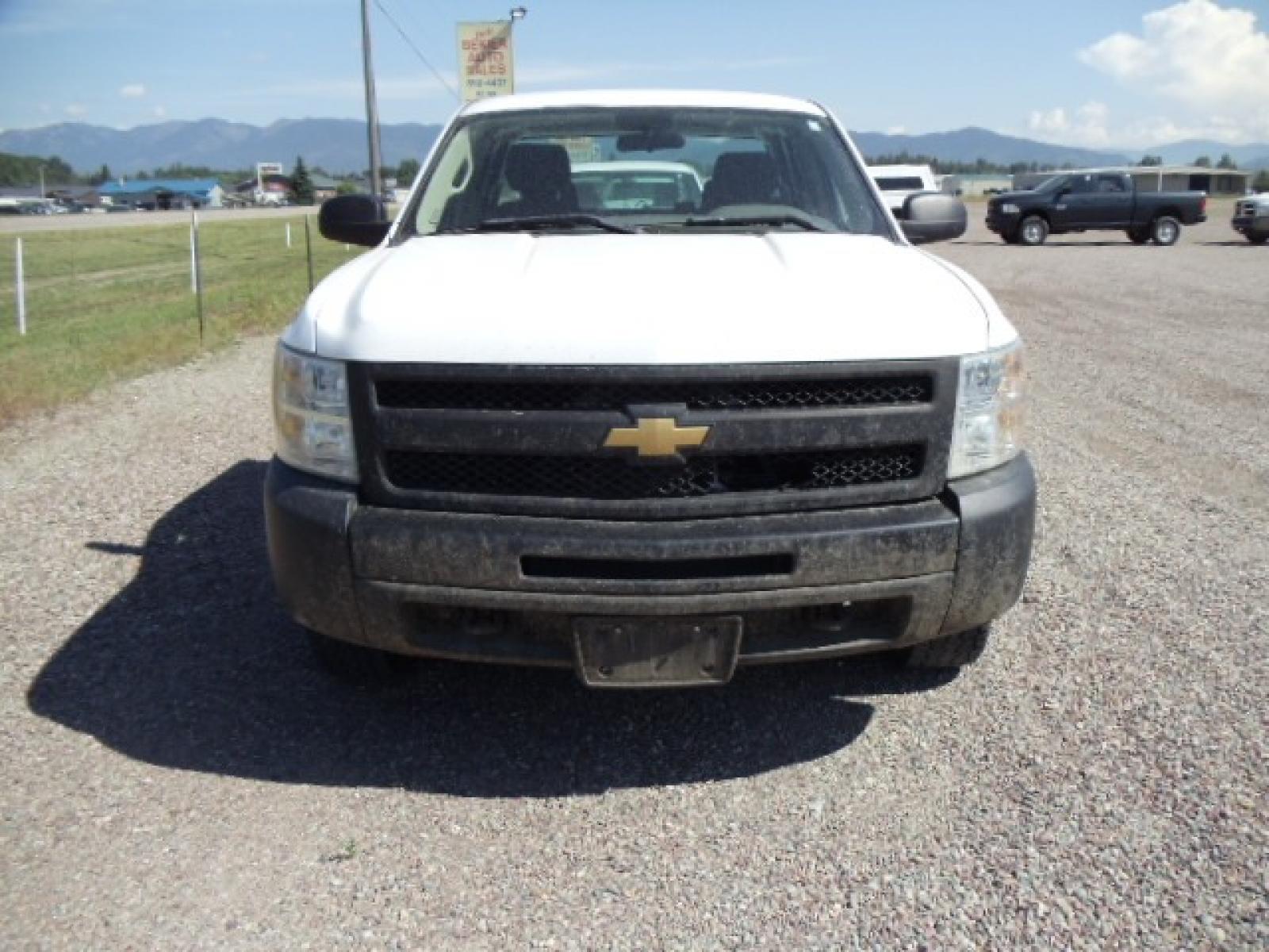2012 White /Grey Chevrolet Silverado 1500 Work Truck Ext. Cab 4WD (1GCRKPE75CZ) with an 5.3L V8 OHV 16V FFV engine, 4-Speed Automatic transmission, located at 5465 Highway 2 W., Columbia Falls, MT, 59912, (406) 892-4407, 48.352188, -114.240929 - Photo #1