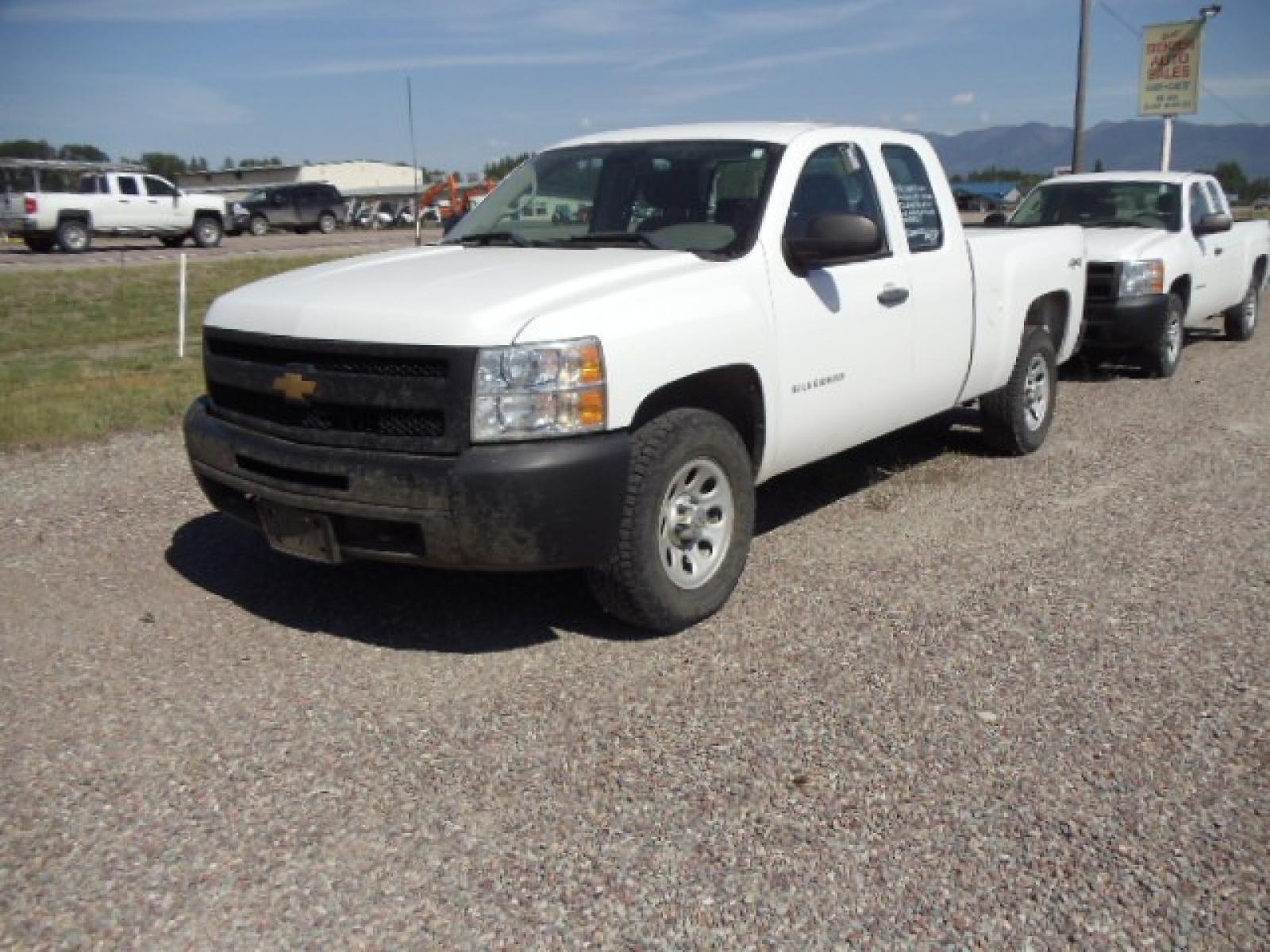 2012 White /Grey Chevrolet Silverado 1500 Work Truck Ext. Cab 4WD (1GCRKPE75CZ) with an 5.3L V8 OHV 16V FFV engine, 4-Speed Automatic transmission, located at 5465 Highway 2 W., Columbia Falls, MT, 59912, (406) 892-4407, 48.352188, -114.240929 - Photo #2