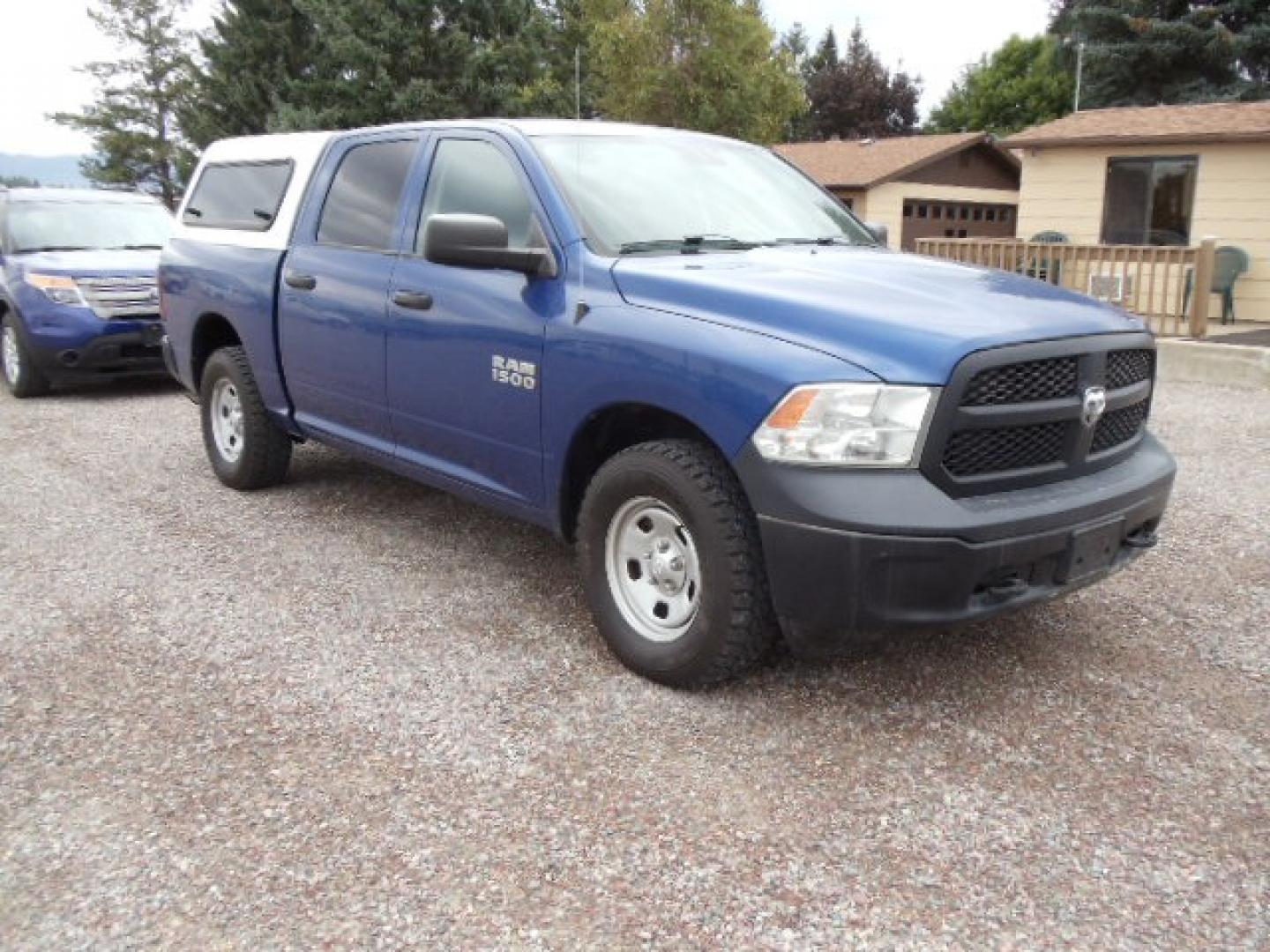 2014 Blue /Gray RAM 1500 Tradesman Crew Cab SWB 4WD (1C6RR7KG0ES) with an 3.6L V6 DOHC 24V FFV engine, 6-Speed Automatic transmission, located at 5465 Highway 2 W., Columbia Falls, MT, 59912, (406) 892-4407, 48.352188, -114.240929 - Photo#0