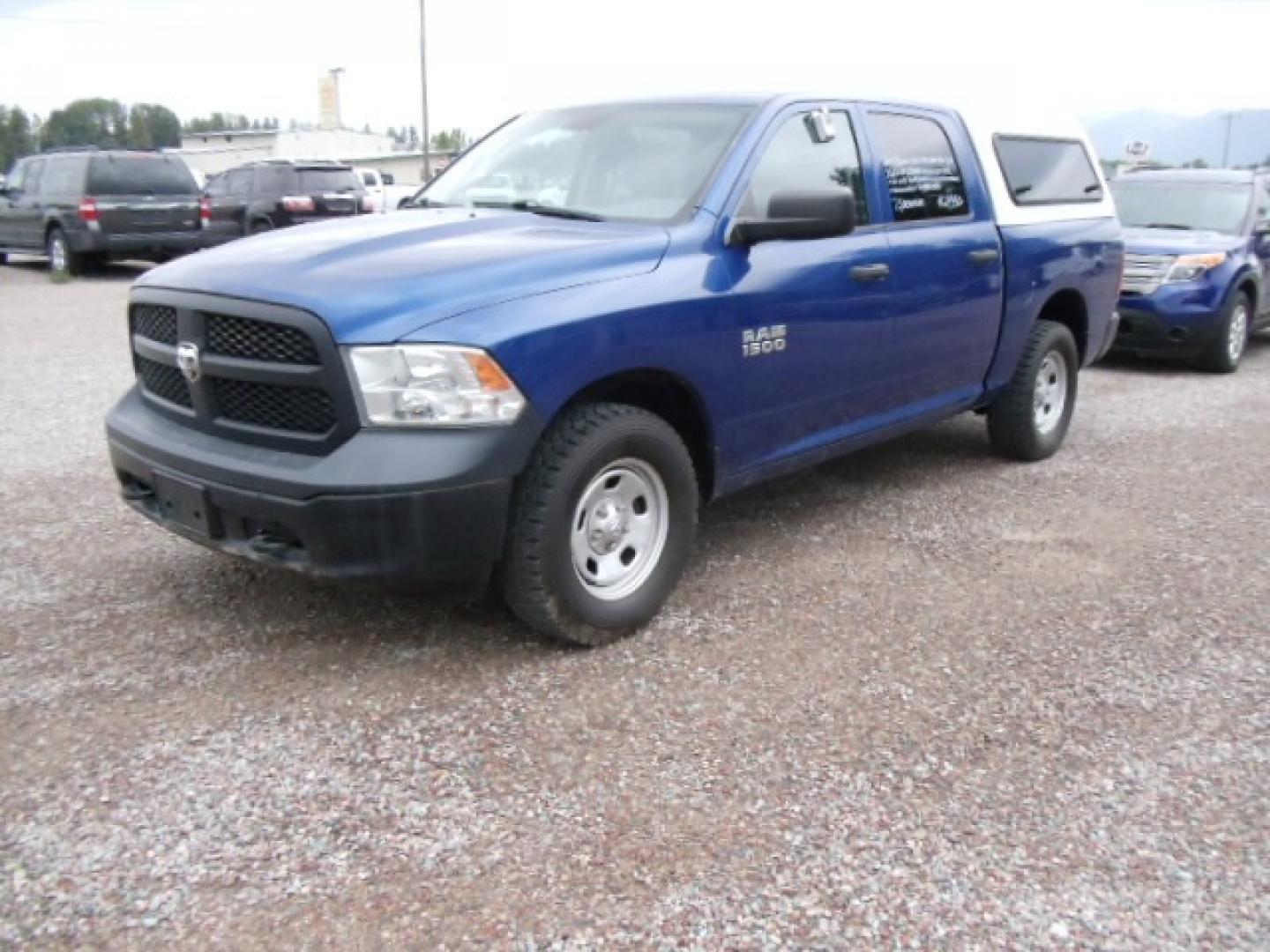 2014 Blue /Gray RAM 1500 Tradesman Crew Cab SWB 4WD (1C6RR7KG0ES) with an 3.6L V6 DOHC 24V FFV engine, 6-Speed Automatic transmission, located at 5465 Highway 2 W., Columbia Falls, MT, 59912, (406) 892-4407, 48.352188, -114.240929 - Photo#2