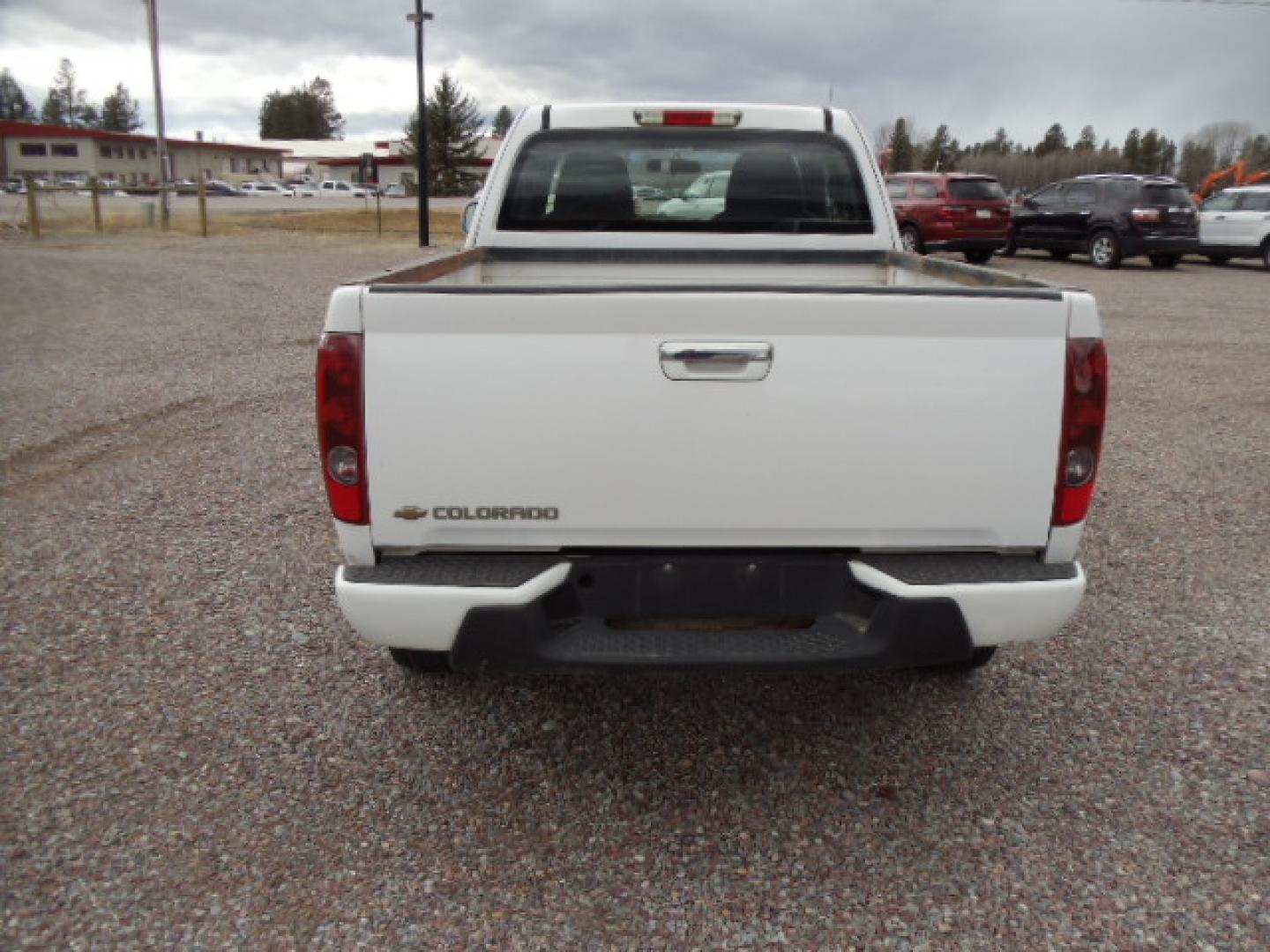 2012 White /Gray Chevrolet Colorado Work Truck Ext. Cab 4WD (1GCJTBFE4C8) with an 3.7L L5 DOHC 20V engine, Automatic transmission, located at 5465 Highway 2 W., Columbia Falls, MT, 59912, (406) 892-4407, 48.352188, -114.240929 - Photo#5