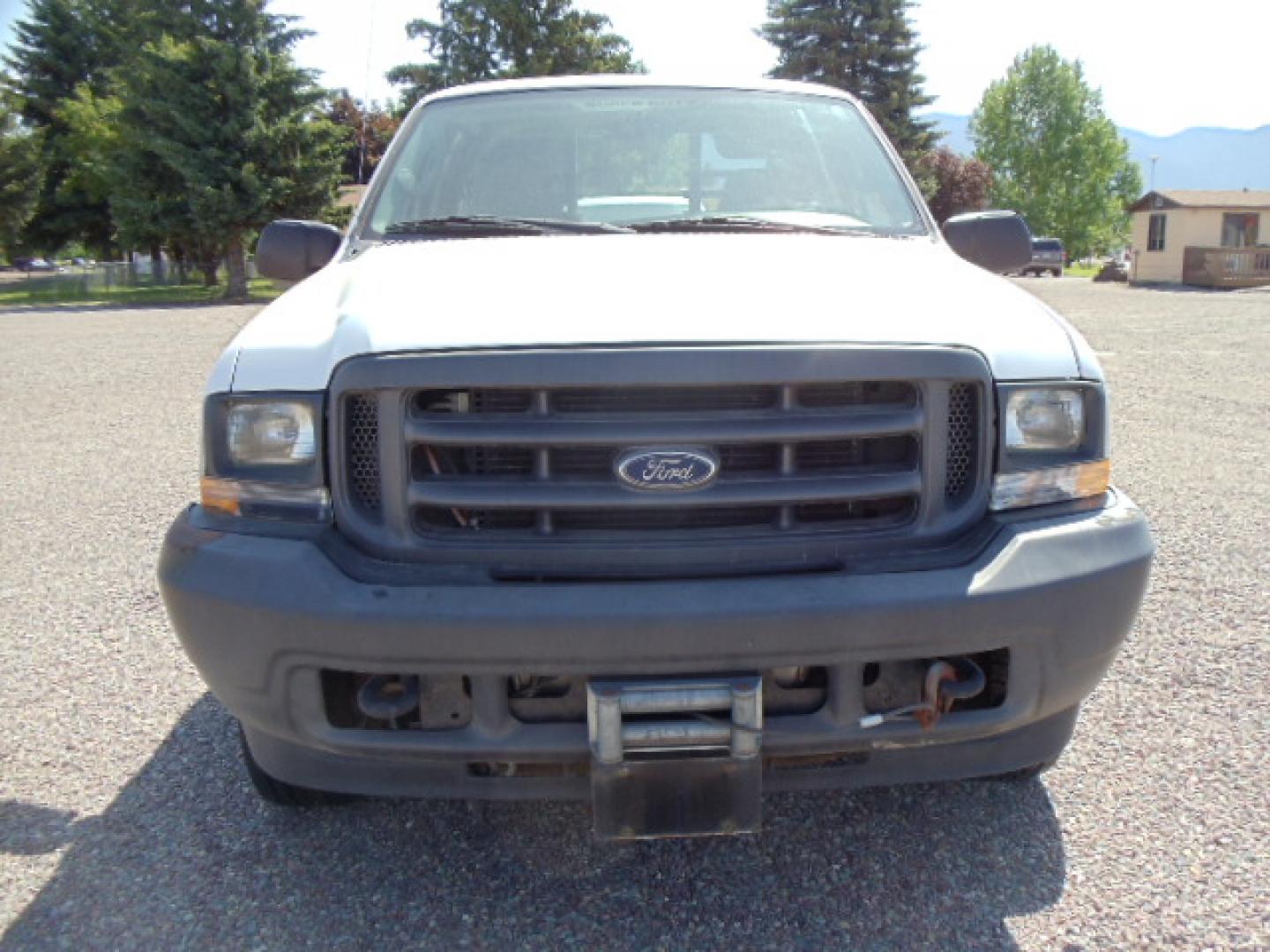 2004 Ford F-350 SD XL (1FTSX31P44E) with an 6.0L V8 OHV 32V TURBO DIESEL engine, 6 Speed Manual transmission, located at 5465 Highway 2 W., Columbia Falls, MT, 59912, (406) 892-4407, 48.352188, -114.240929 - Photo#1